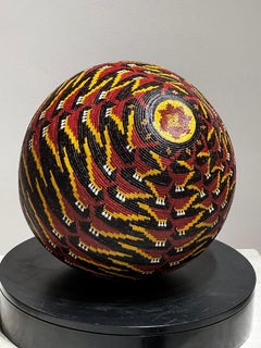 Heliconia plant, basket, Wounaan Tribe, palm fiber, natural dyes, red, black