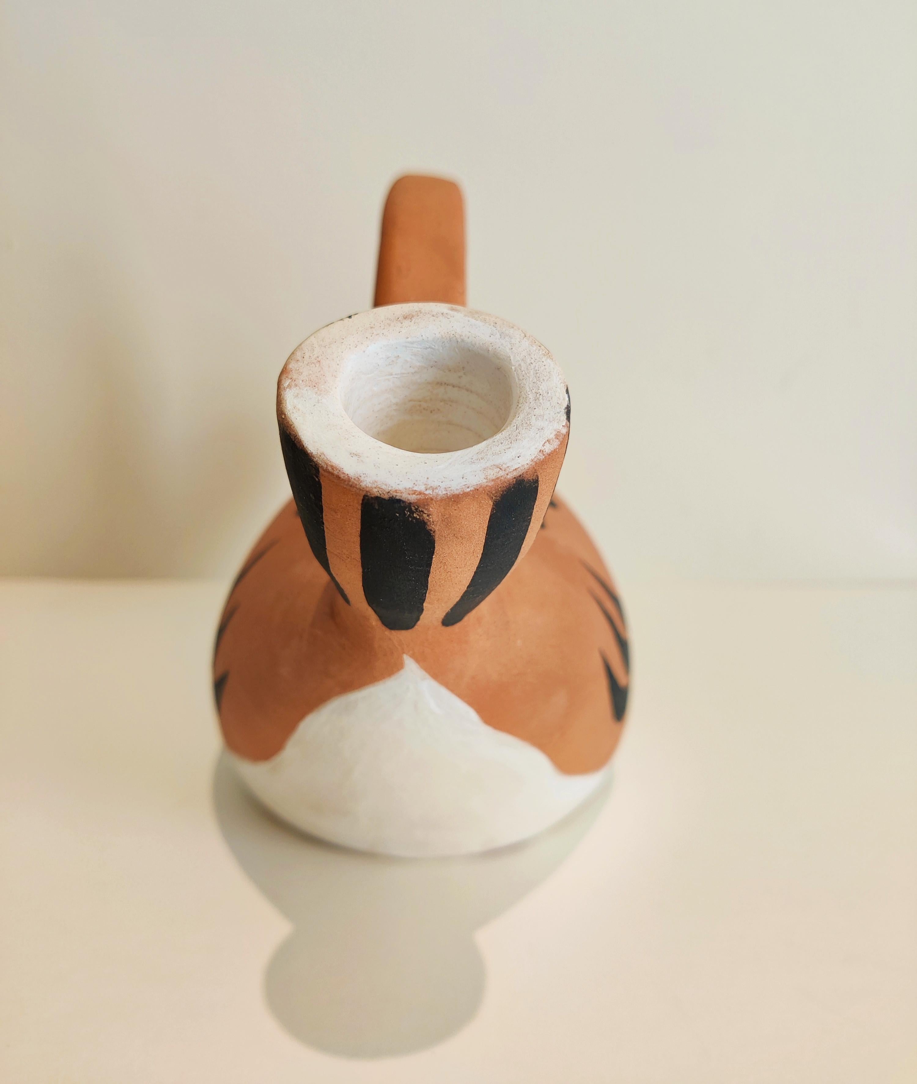 Pablo Picasso
Fish Subject (Sujet poisson), 1952
Ceramic pitcher, made of red earthenware clay, partially glazed and painted in black and white. 
Size 14 x 23 cm
Edition:	From the edition of 500.
Inscribed 'Edition Picasso Madoura' and with the