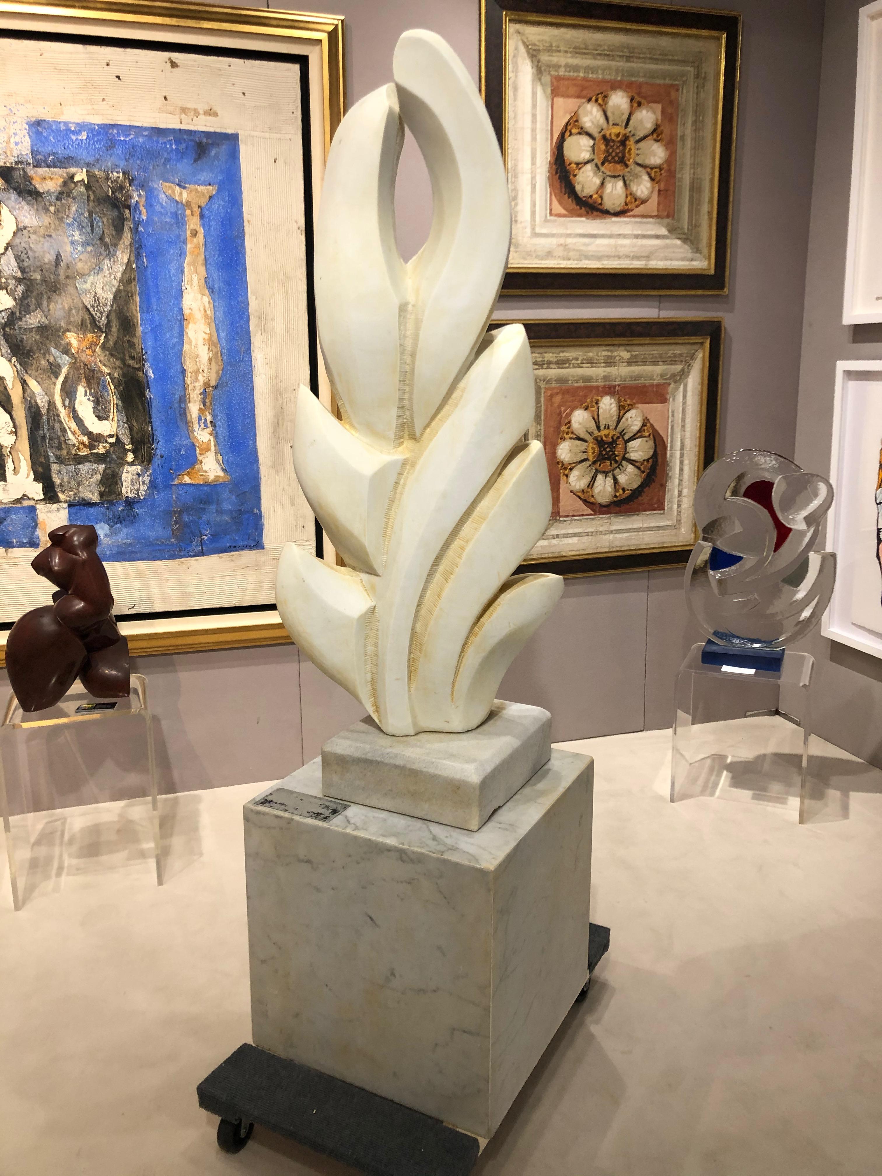 Suddenly It's Spring Carrara Marble Sculpture 1990 Pietra Santa Italy
Signed on the back, also plate with title, date on the marble base pedestal stunning sculpture for indoor or outdoor.
Sylvia Jaffe 1928-2011
 Floridian artist and sculptor, whose