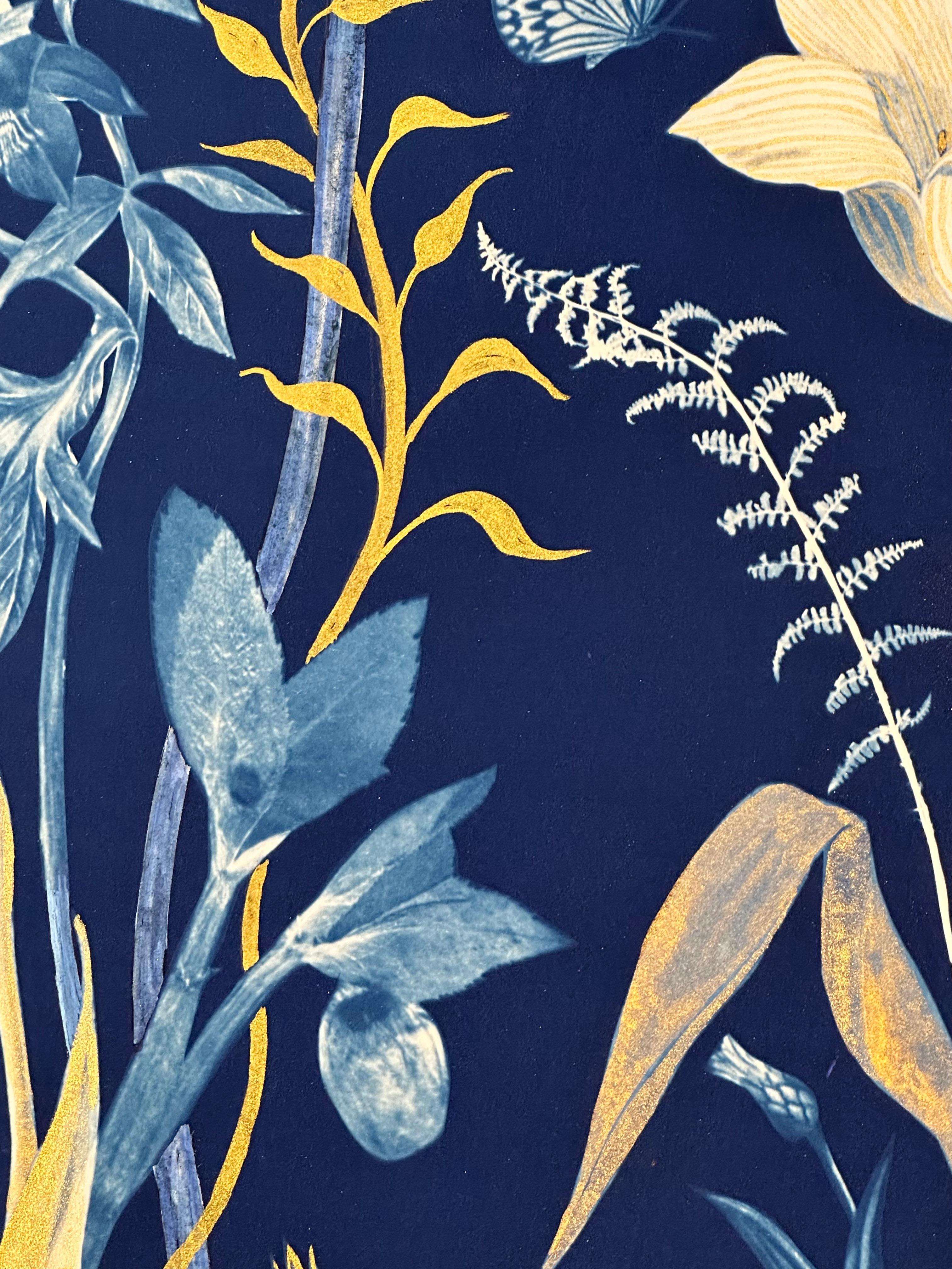In this painting in watercolor, gouache, India ink, gold pigments and tea-toned cyanotype on cotton watercolor paper, meticulously detailed flowers and plants including tulips and monstera are depicted in white and gold against an indigo blue