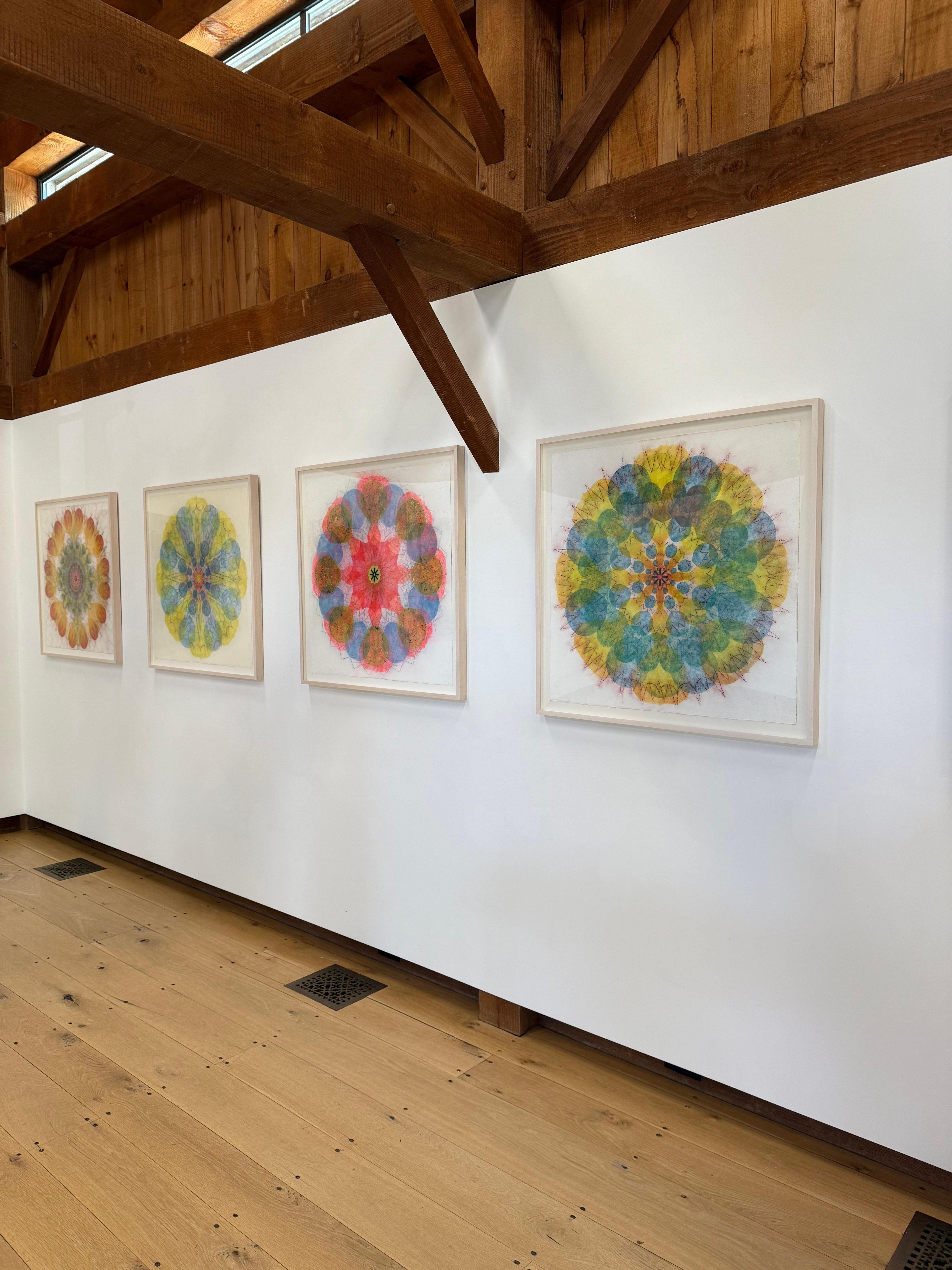Watermill Pinwheel 10 is a geometric abstract mandala made with Mary Judge's unique powdered pigment technique in orange, green and bright pink in the center in an intricately layered design. The combination of the ordered symmetry and the rich,