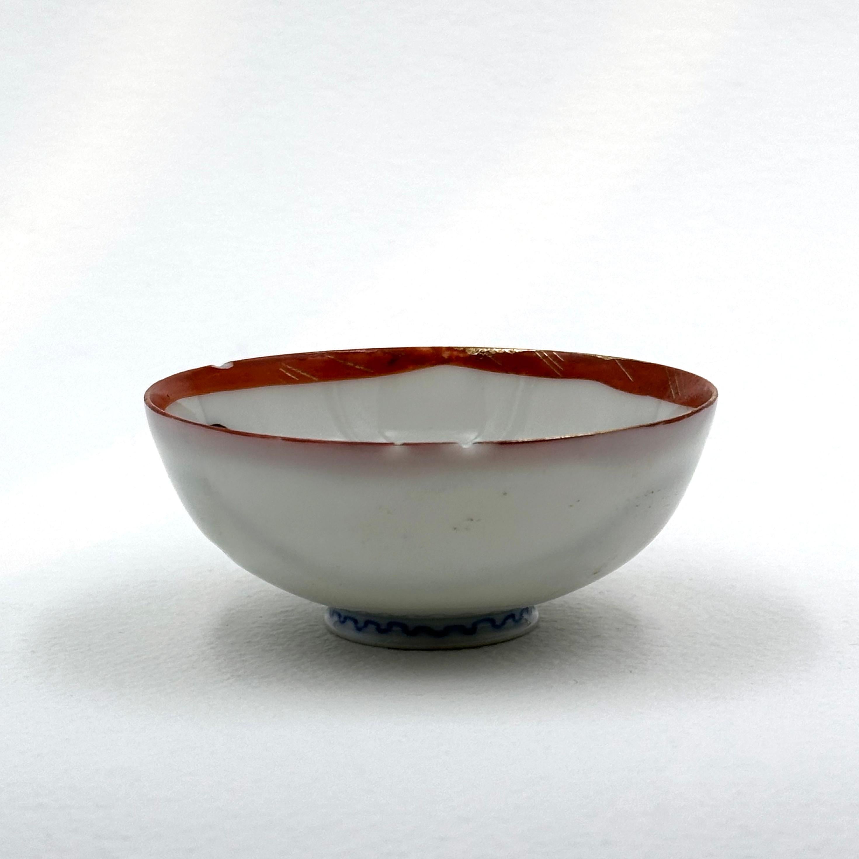 Hand-painted Japanese Sake Bowl

1890-1918
Fine porcelain, gold luster
1.25 x 2.75 x 2.75 inches

Condition note: 2mm rim chip