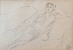 Young woman lying on the sofa