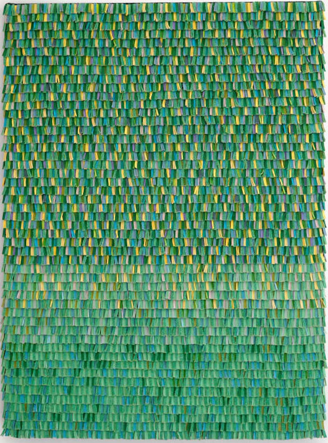 Opera d'arte in pelle intrecciata con sfumature di colore verde e giallo