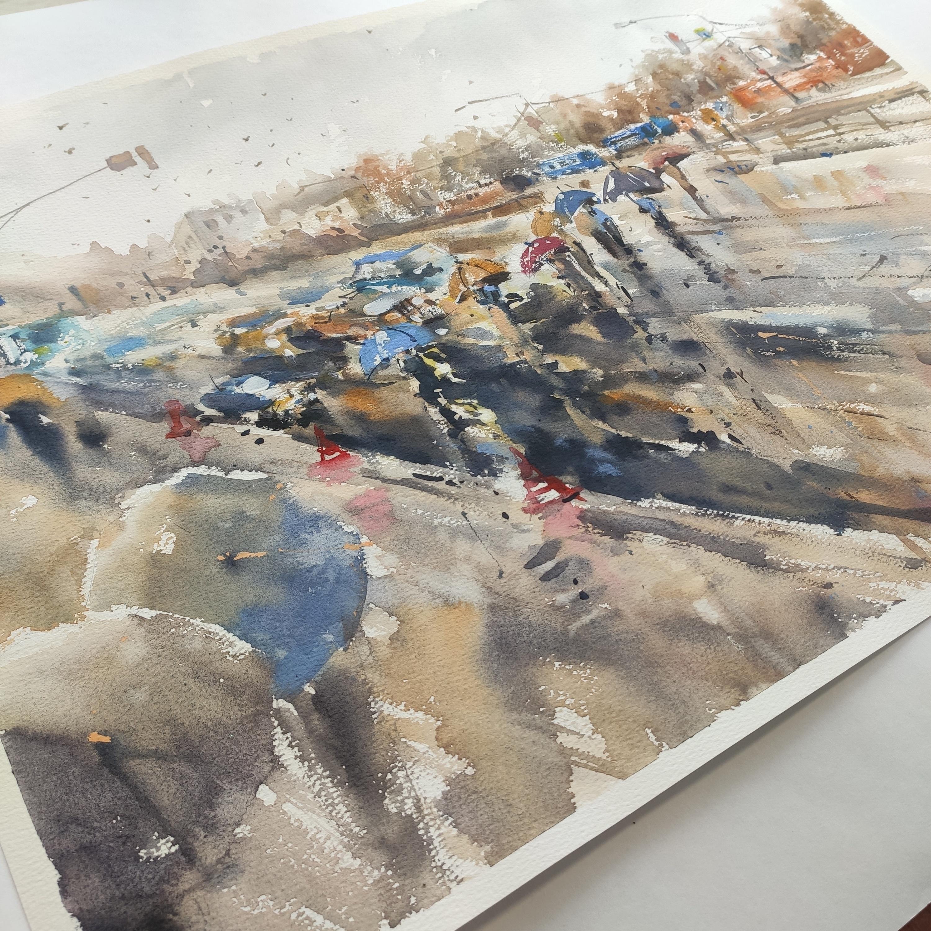 La peinture de la ville, réalisée selon la technique de l'aquarelle de l'auteur, résonne par ses couleurs. Aquarelle contrastée et lumineuse avec un paysage urbain, peinte sur papier coton 40x60cm. La peinture traduit la dynamique, le mouvement et