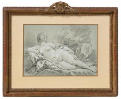 Reclining female nude with her legs out and looking up to the right