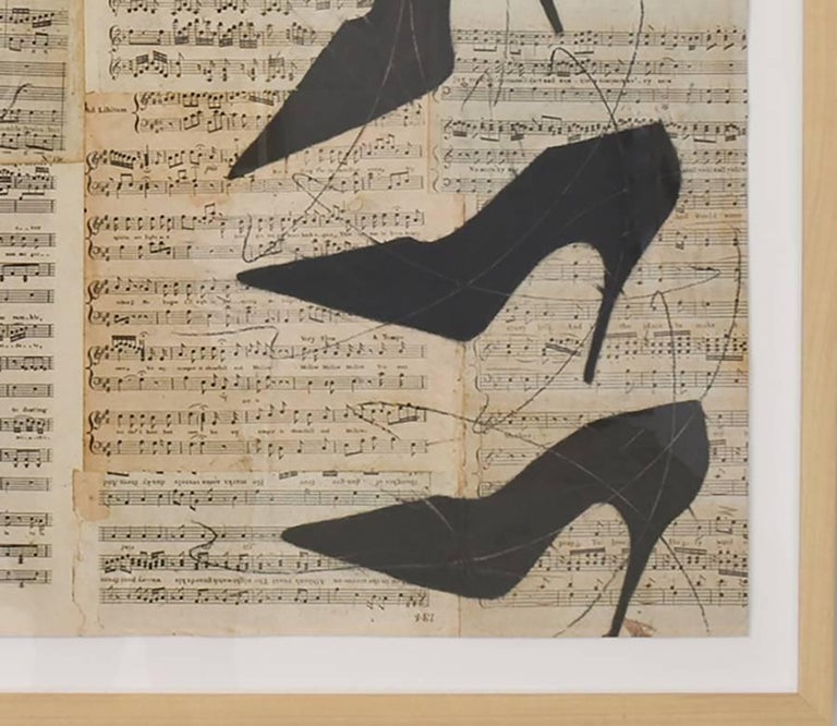 Figurative, still life chalk drawing of black high heels on vintage collaged music sheets.
Artwork measures 29 x 33 inches
30 x 37 inches framed, deckle edge paper is floated in natural wood moulding with glass. 

This modern, graphic chalk drawing