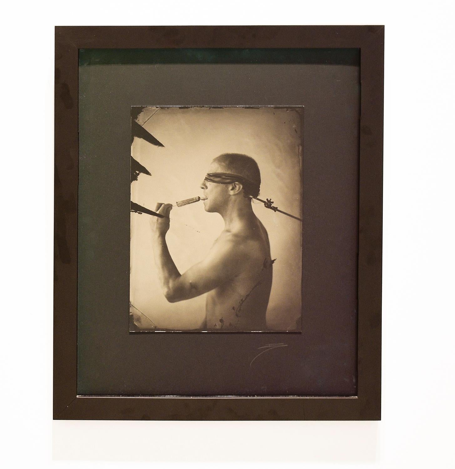 Linguist (Salacious Tin Type Photo of Male Nude Licking an Ice Pop, blindfolded) - Photograph by David Sokosh