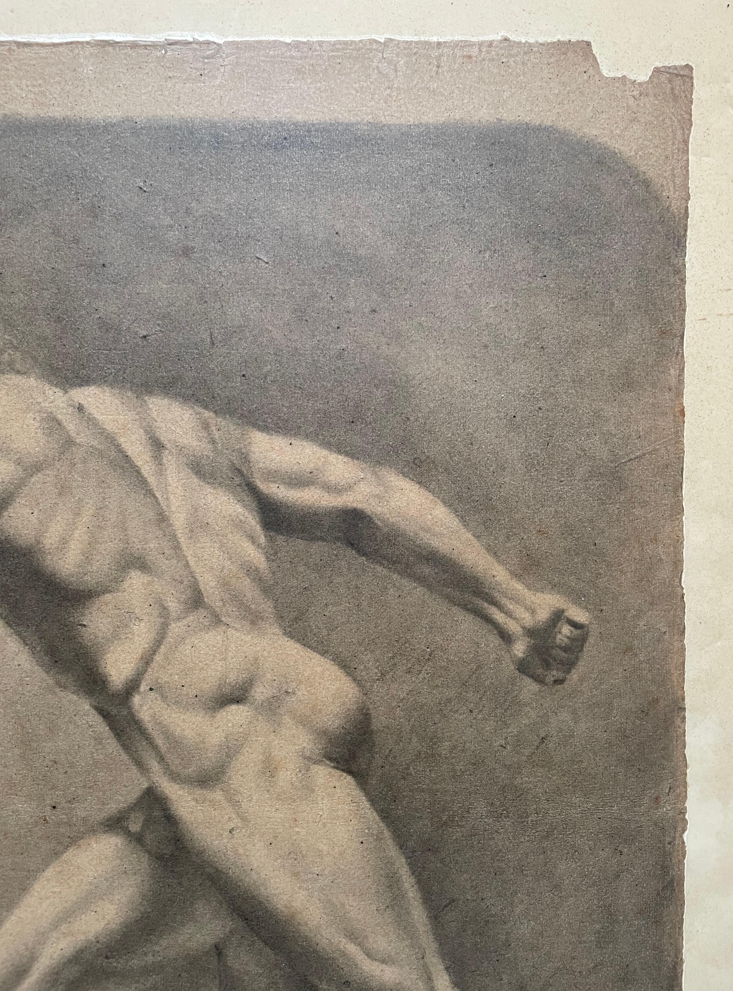 Drawing of a sculpture representing a naked athlete.  Black chalk on paper.  The paper laminated on cardboard and wrapped under plastic film (?)  Traces of folds, small stains.  The drawing: 60 x 46 cm