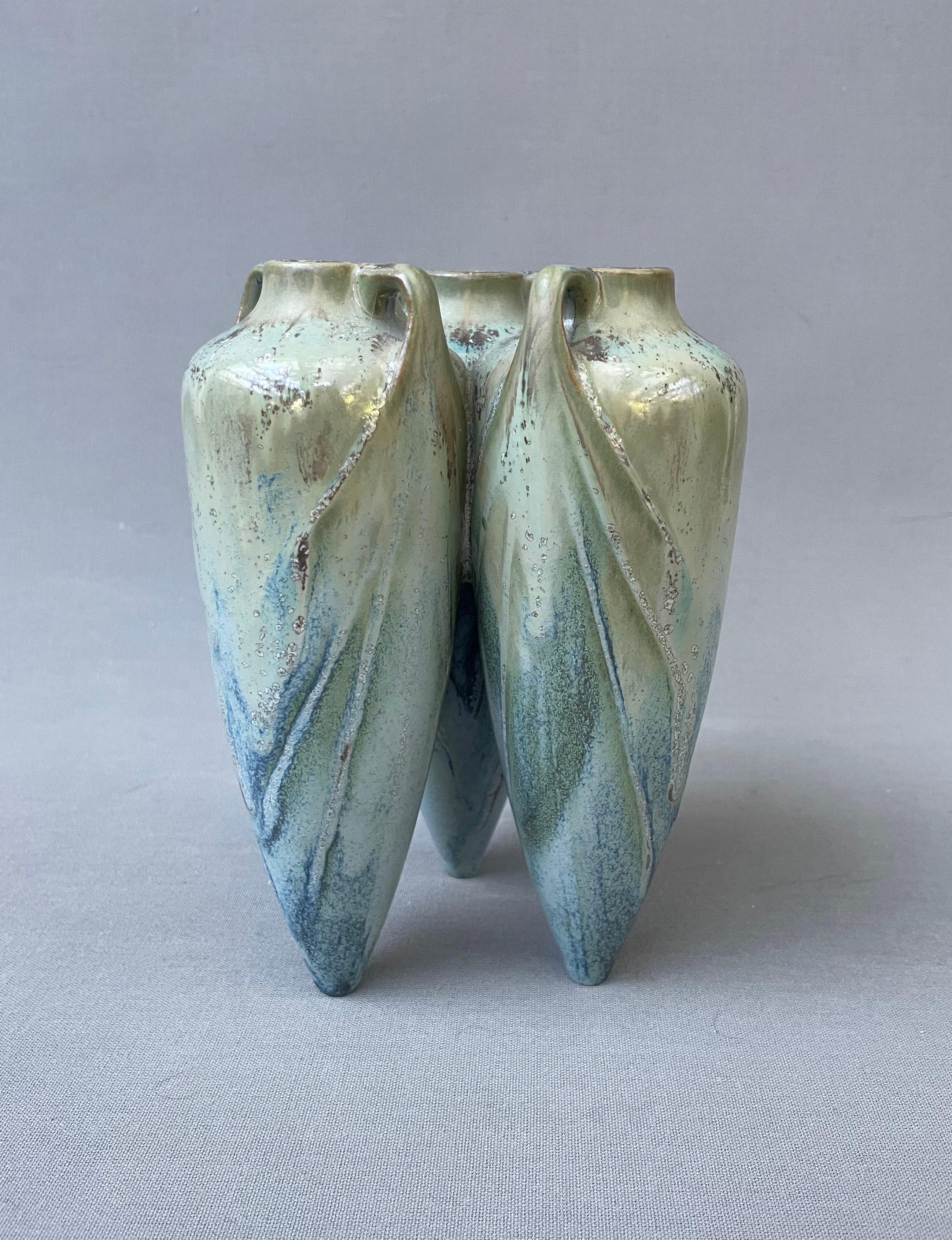 Small stoneware vase with three adjoining amphorae.  Very good condition.  Height: 15.5 cm.