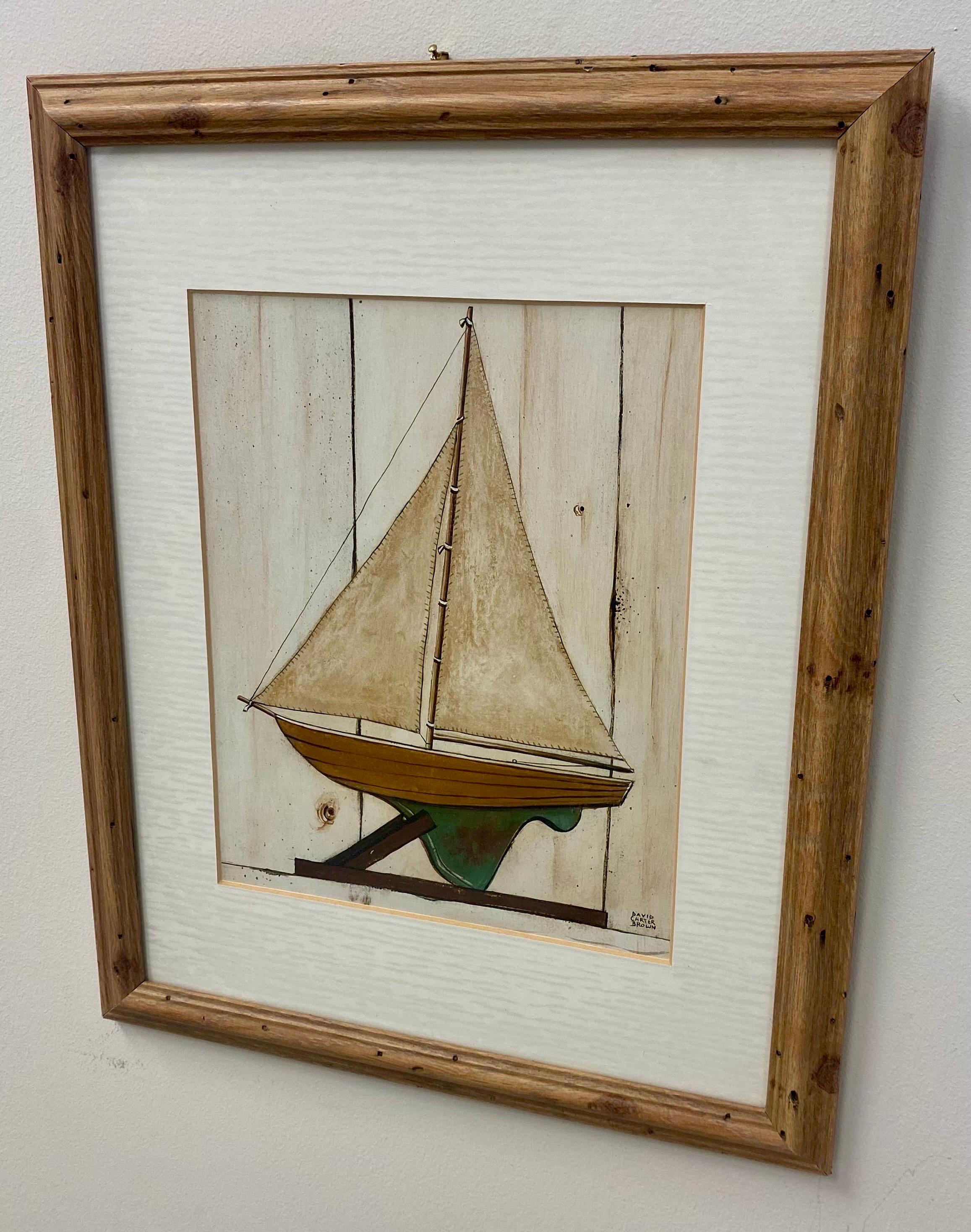 An American Folk Art sail boat model print by David Carter Brown ( American ). The sail model print feature earthy brown colors and is signs by the artist in the bottom right. The art work is finely presented in a white matting and matching custom