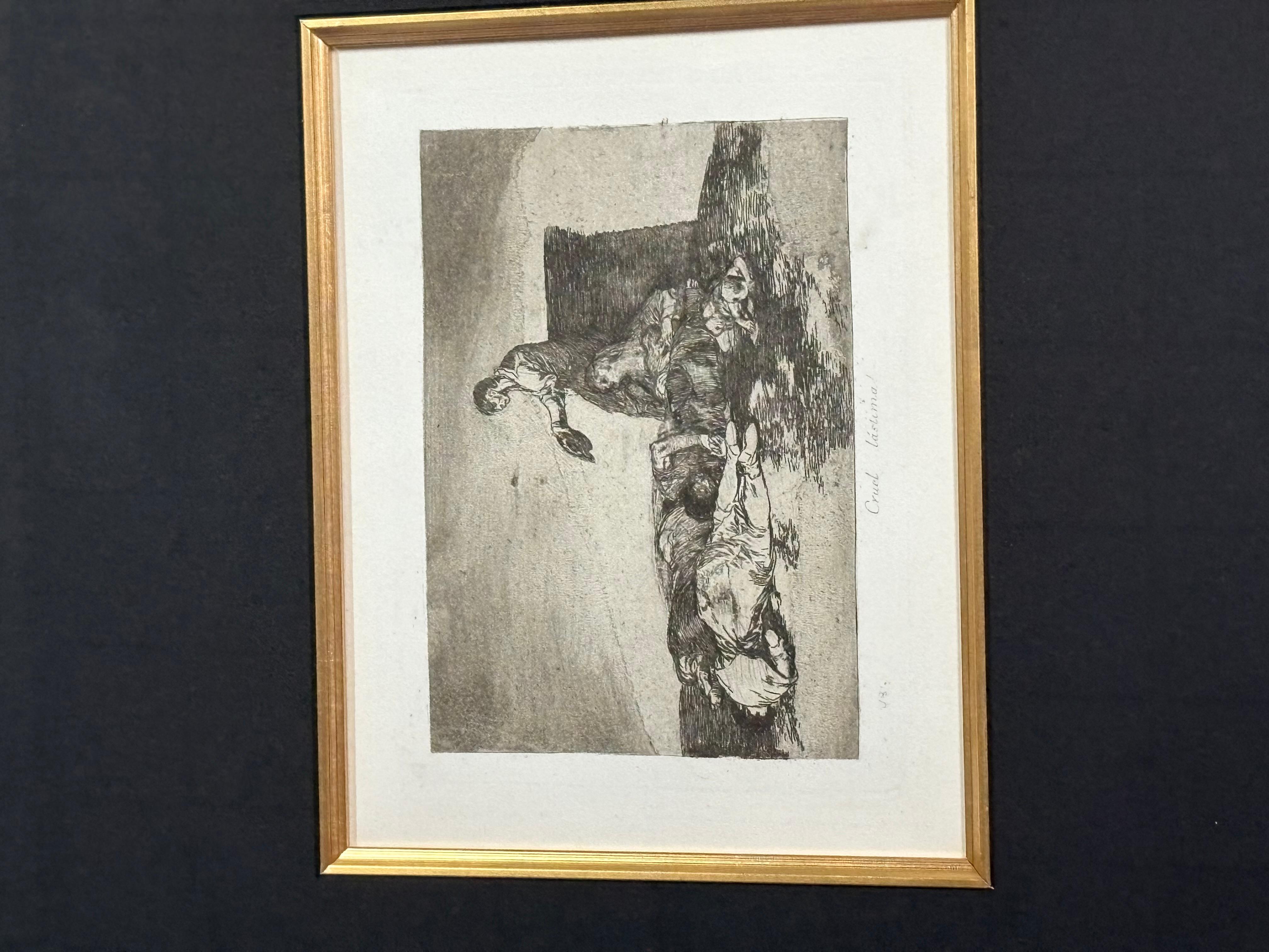 Francisco Goya Cruel Lastima Etching 1810-1815. In good condition some minor wear to the frame. Measures 36x32