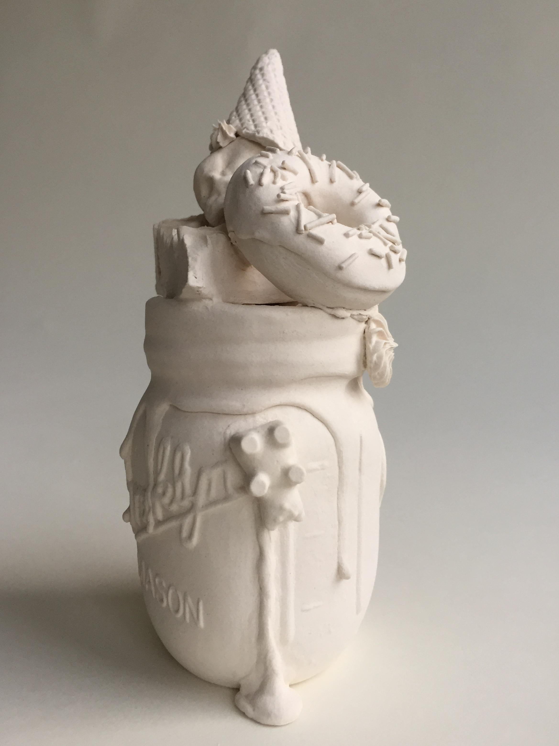 This piece consists of a porcelain slip-casted jar base, intricately topped with slip-casted fetus skulls, donut, and sweets. Decorated with hand piped details and hand rolled sprinkles.  Jacqueline Tse channels her love-hate relationship with sugar