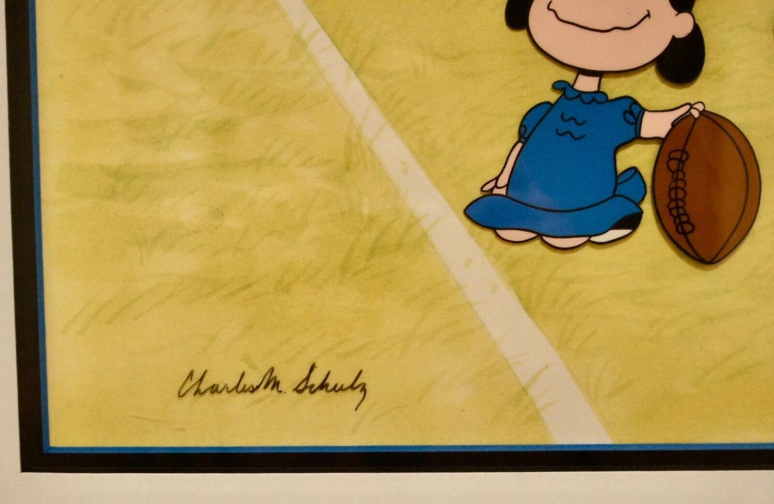 lucy charlie brown football