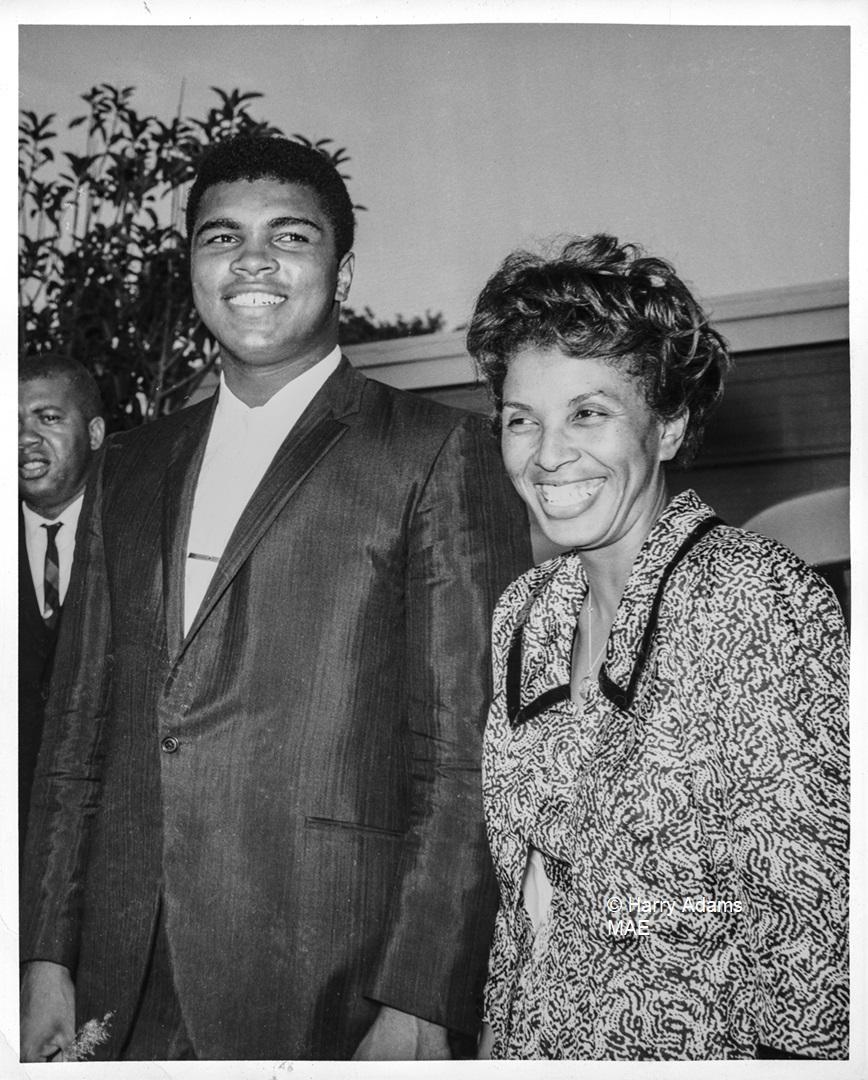 Icons, people - Muhammad Ali smiling with Lorraine Adams, Los Angeles, Aug 1964