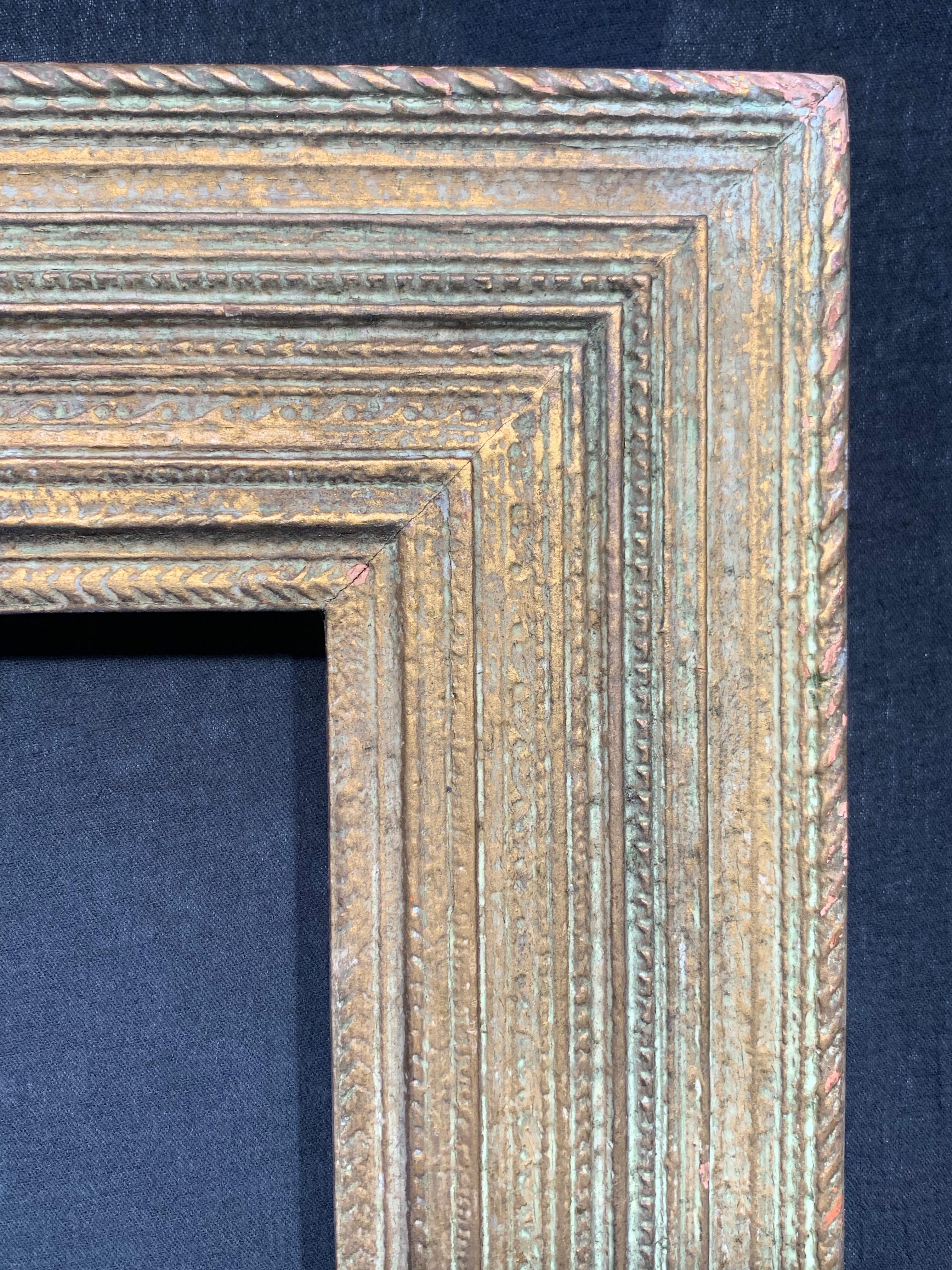 PERIOD FRAMES c. 1915 American painting frame pair, (earlier Stanford White design), Newcomb-Macklin, New York makers, gold leaf, gray bole, gesso, on cast ornament on wood. Flat panel profile with alternating rows of applied ornament. These