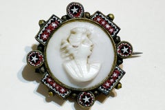 Broche de micromosaico y camafeo de concha rosa.Principios del siglo XX. Firmado F.A.P. Florence