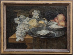 Antique Natura morta con uva, ostriche, limone. Circa 1700. 