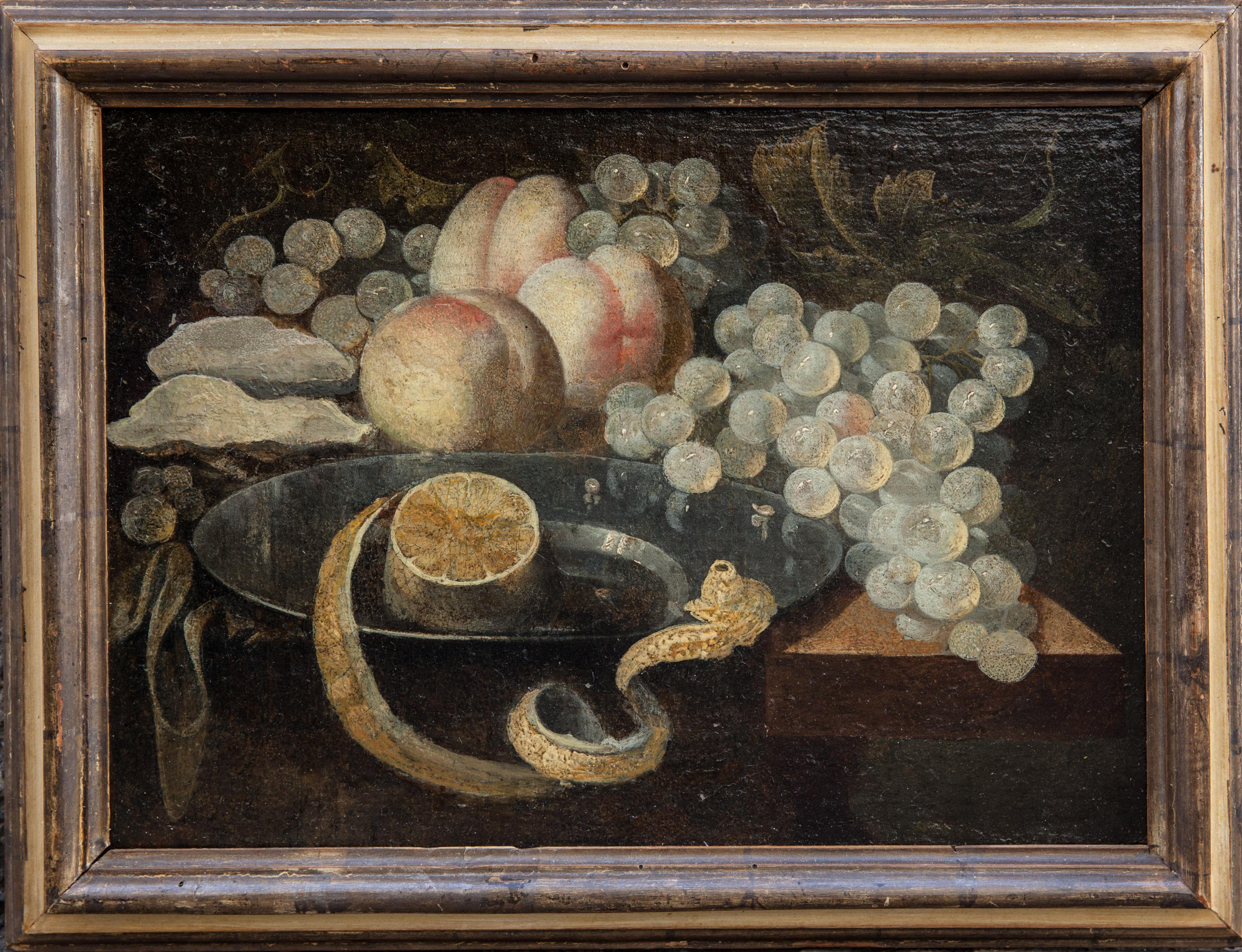 Unknown Figurative Painting - Still life of lemon upon a pewter dish, oysters, grapes, and 3 peaches. 