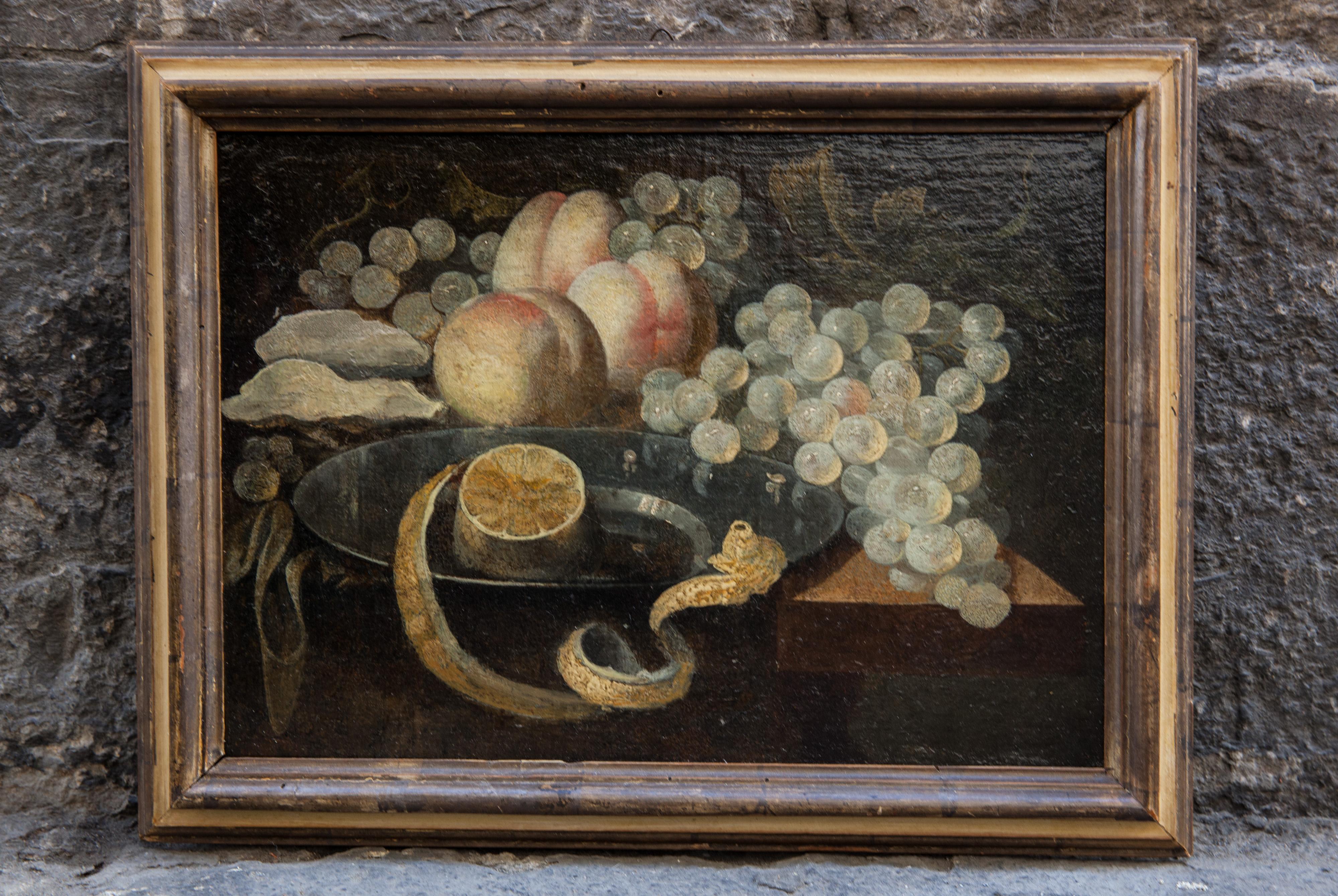 Still life of lemon upon a pewter dish, oysters, grapes, and 3 peaches.  - Painting by Unknown