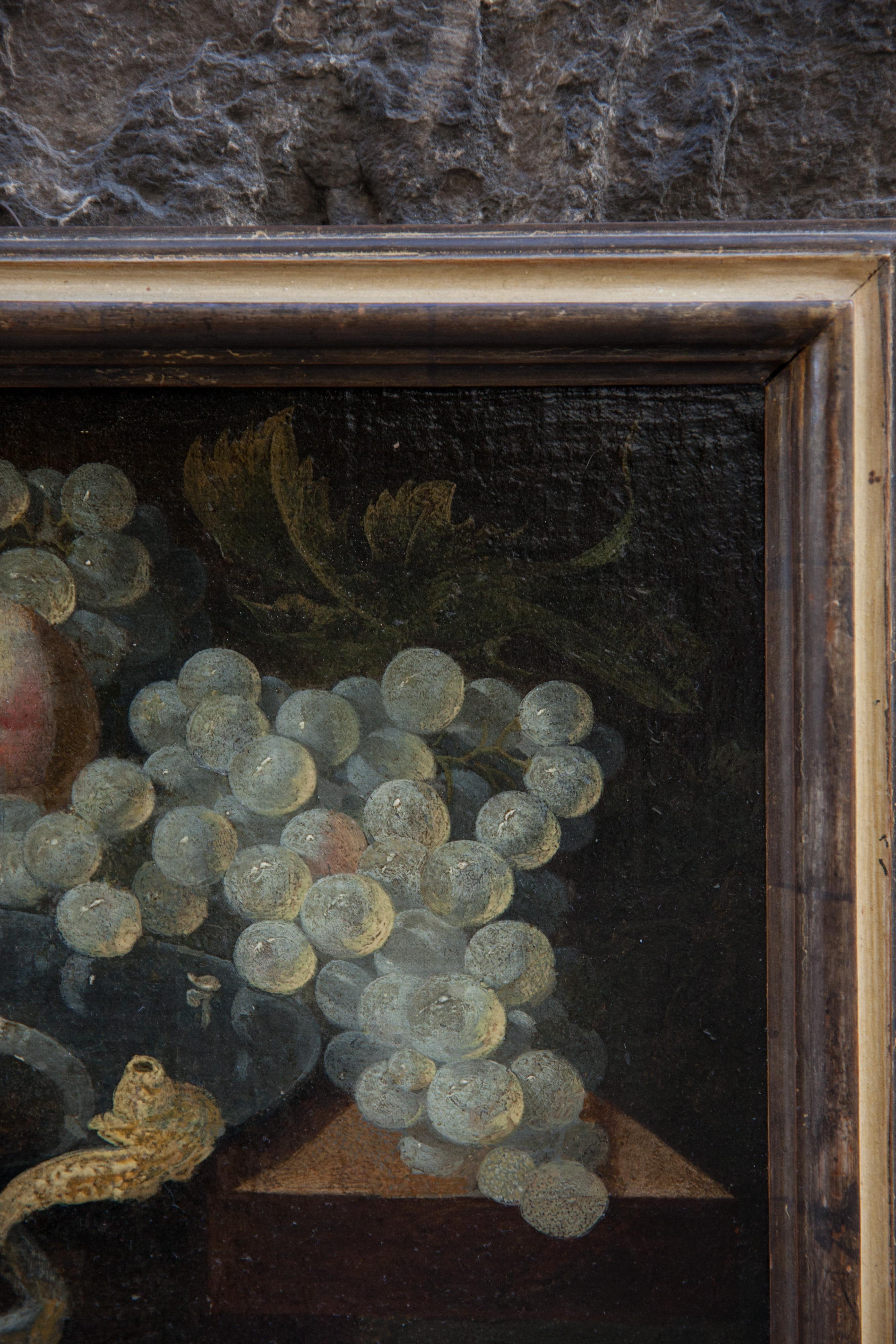 Still life of lemon upon a pewter dish, oysters, grapes, and 3 peaches.

The painting belongs to the tradition of still life painting in Antwerp.

Late XVII- early XVIII century.
Oil on canvas, applied on wooden panel.In period frames in painted and