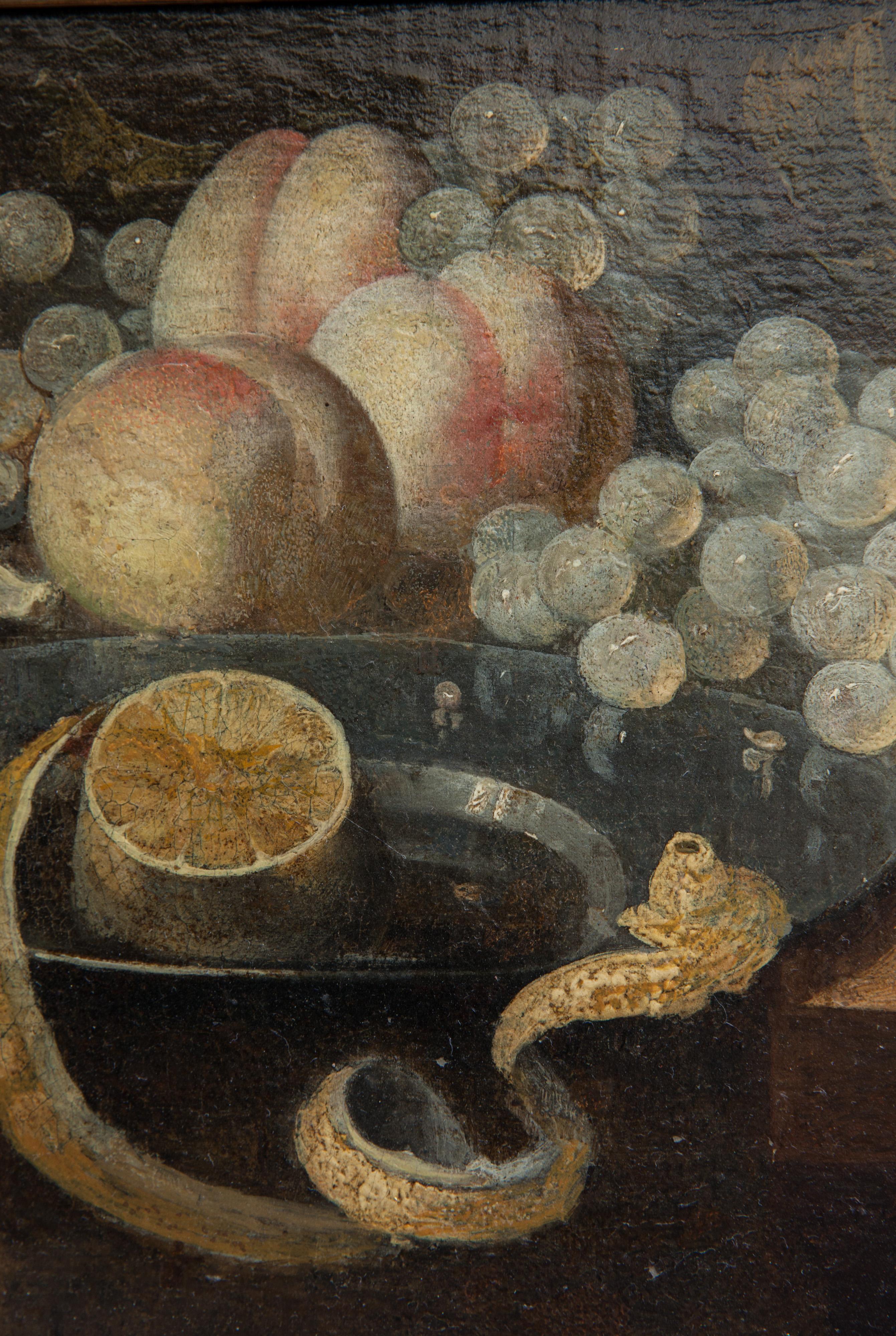 Still life of lemon upon a pewter dish, oysters, grapes, and 3 peaches.  1