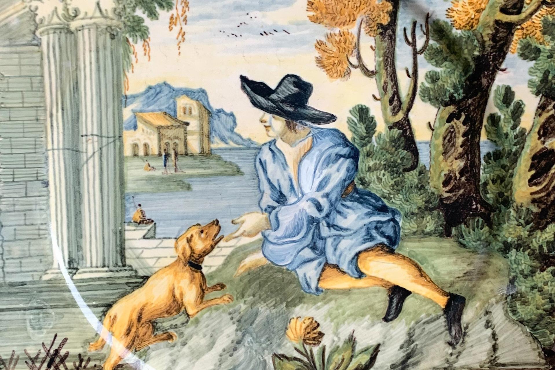 Maiolica Plate by Castelli. Young man in black hat, dog and classical ruins. im Angebot 1