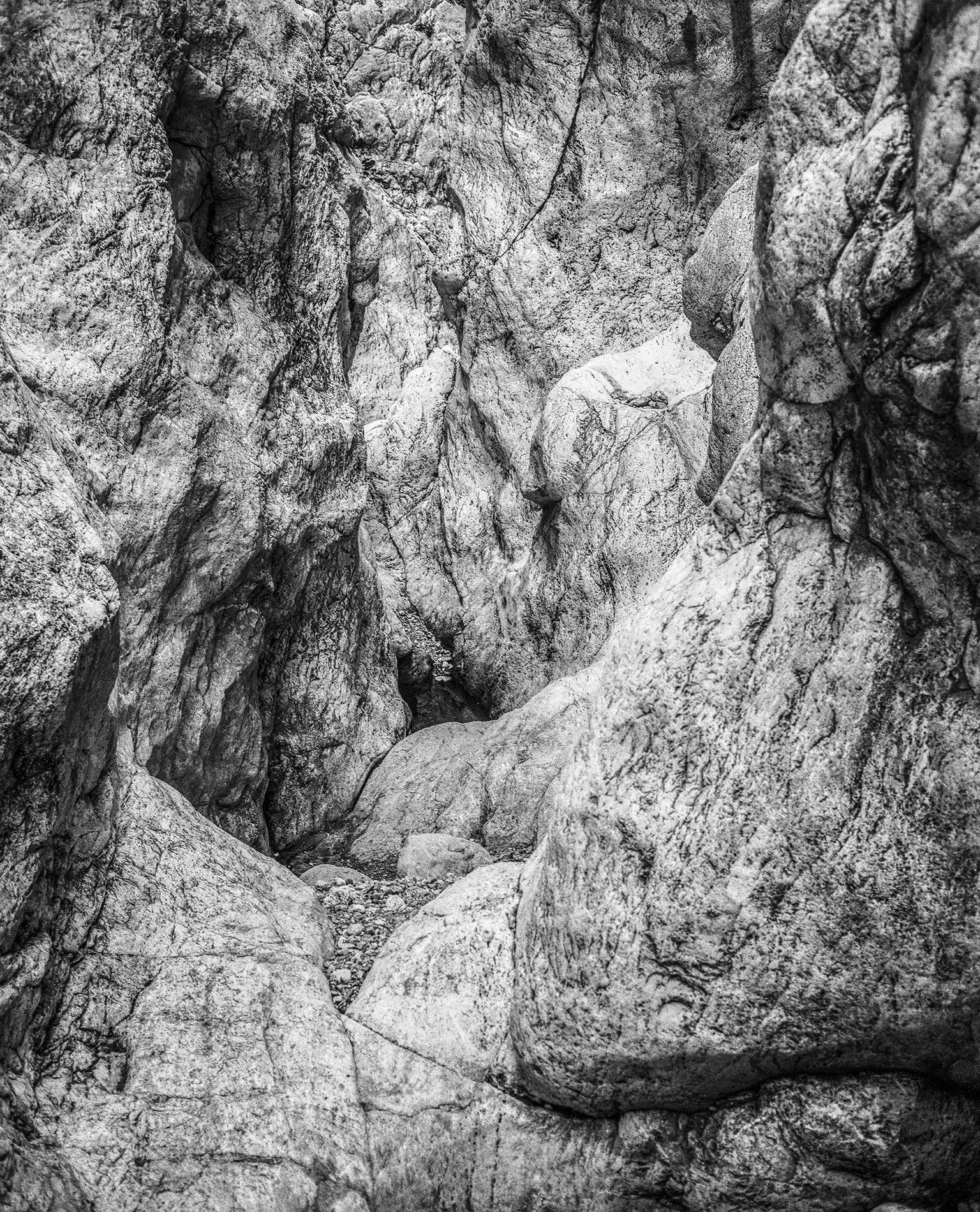 John Stathatos Black and White Photograph - Homage to Heraclitus: Earth IV - Black and White Landscape Photograph of a Cave