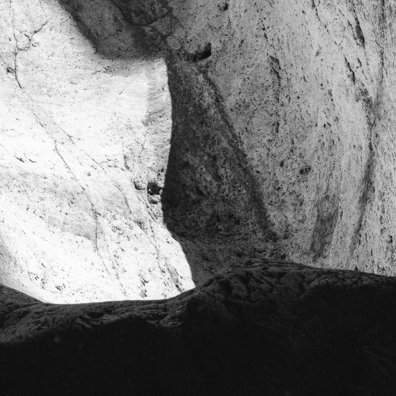 Earth VI - Black and White Photograph, Cave, Rocks, Natural Landscape, Light For Sale 2