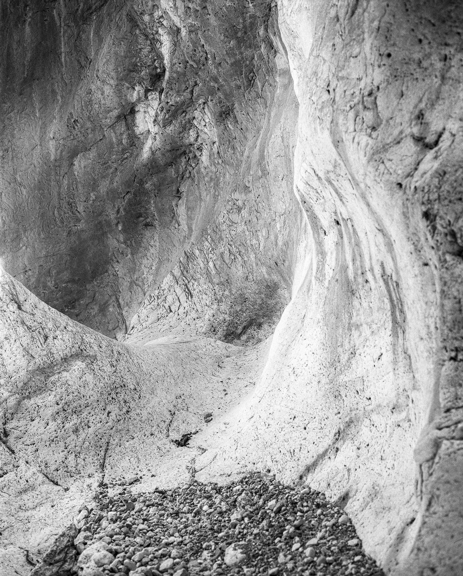 John Stathatos Landscape Photograph - Earth VIII - Black and White Photograph, Stone Cave, Rocks, Natural Landscape