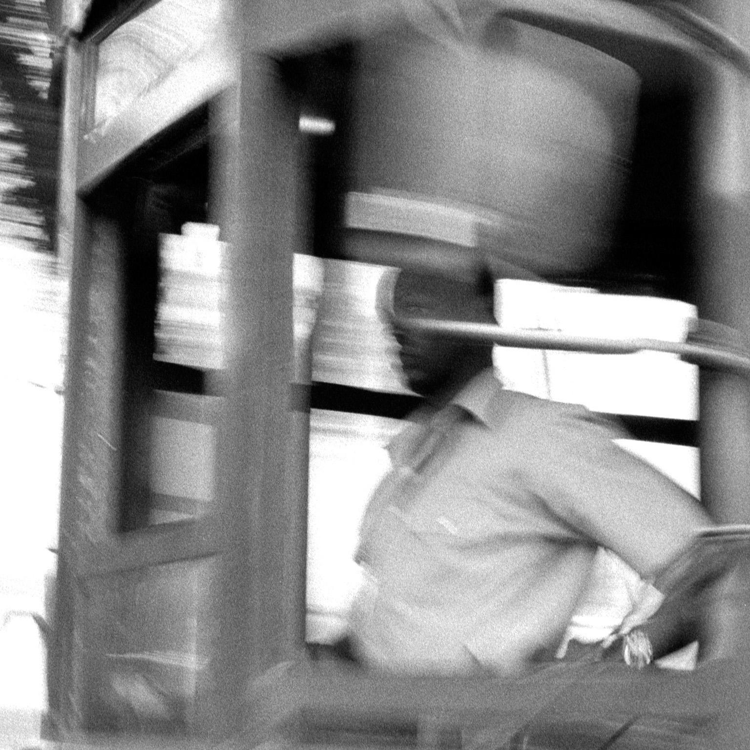 1999-New Orleans - Black & White Photograph of New Orleans Street Car Conductor - Gray Black and White Photograph by Jean-Luc Fievet