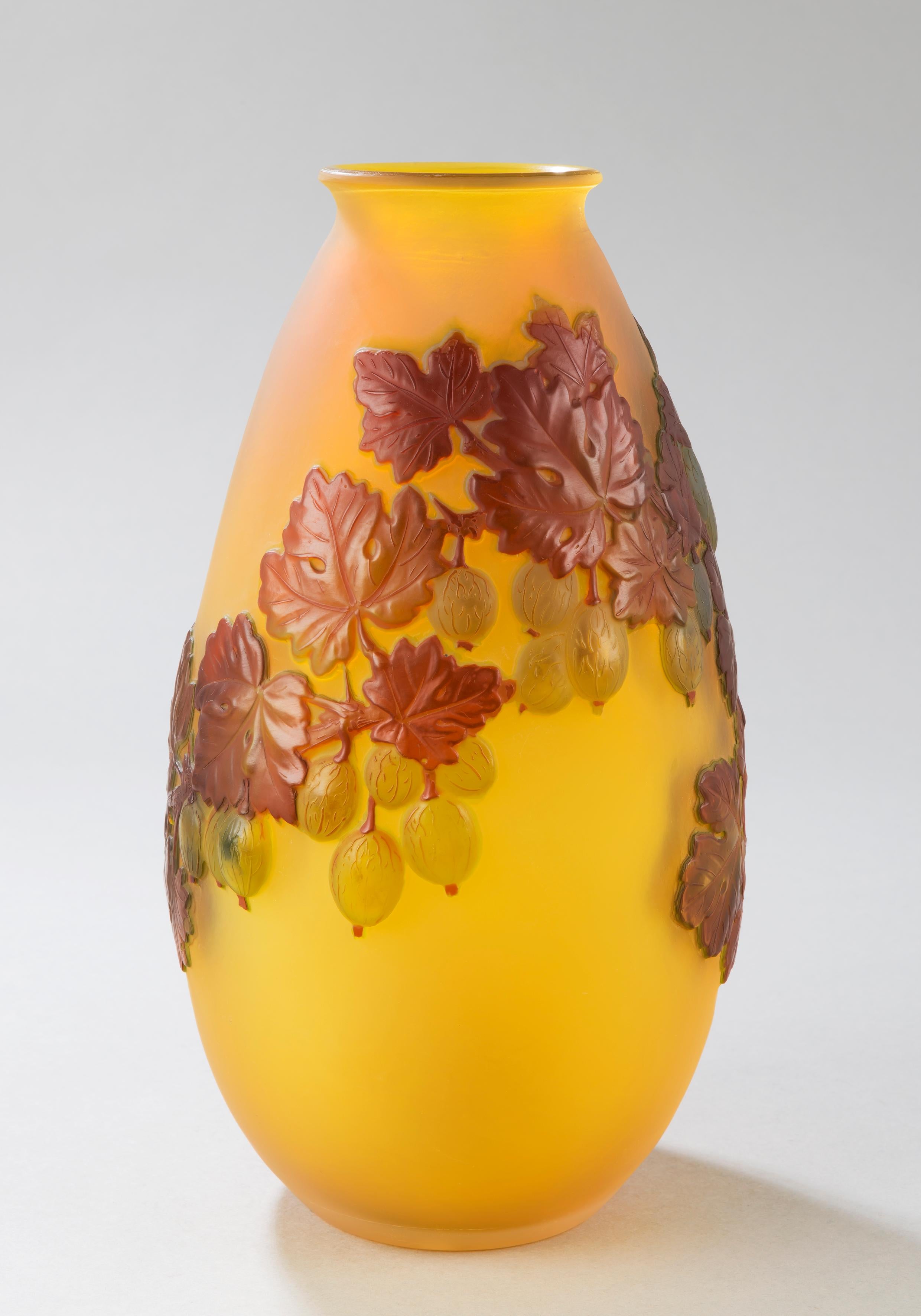 Soufflé Vase with Gooseberries
by Etablissements GALLE
 
Vase of ovoid shape
Multilayer blown glass
decorated with acid-etched gooseberries 
on a yellow background

Signed 