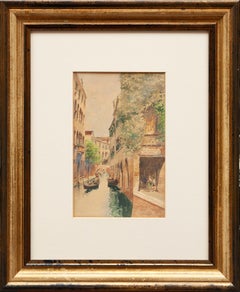 Antique Canal with gondola in Venice