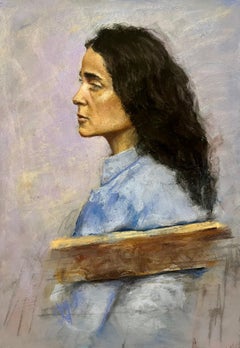Side Profile of Woman with Dark Curly Hair
