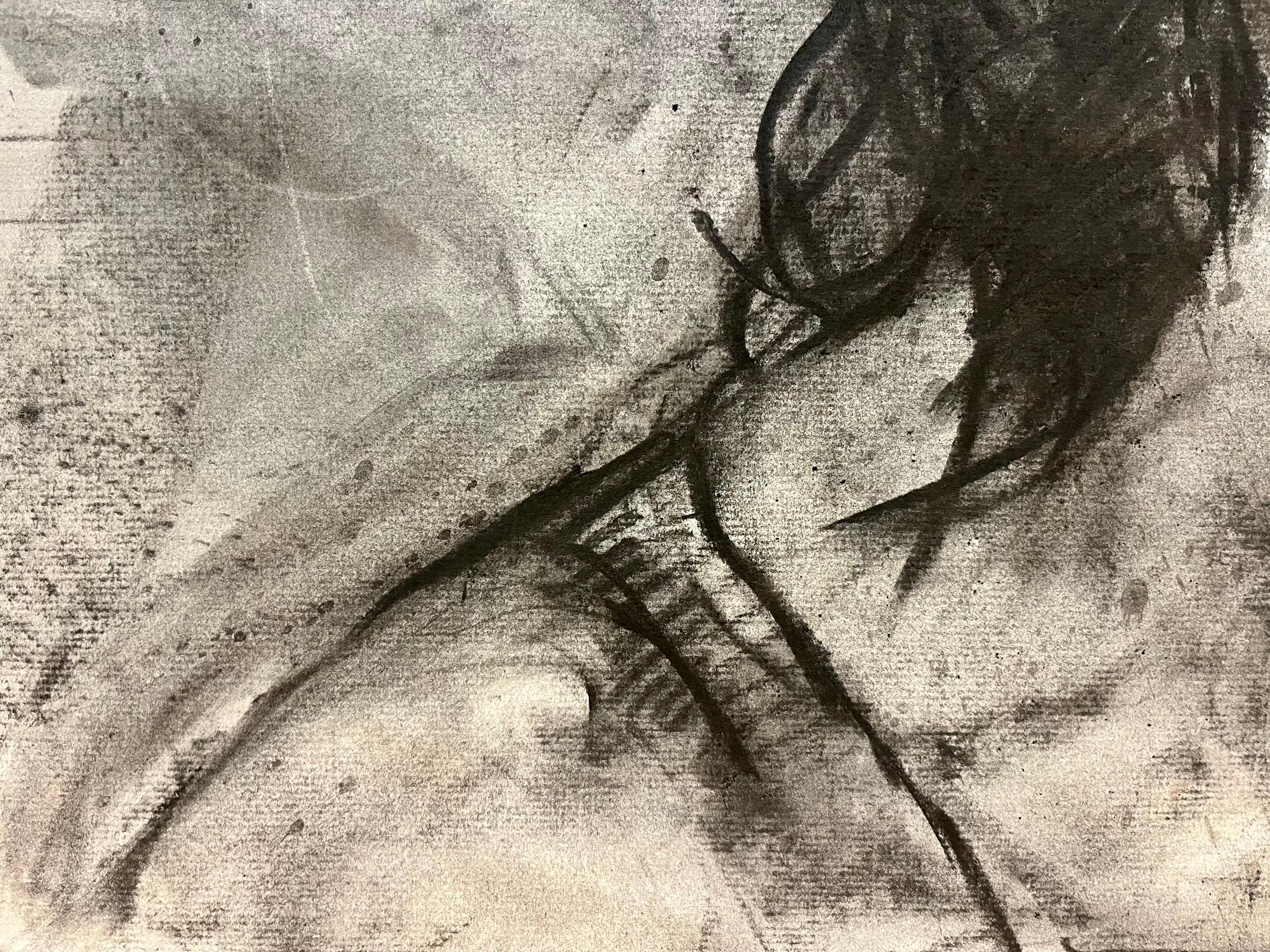 This evocative charcoal drawing portrays a man with dark, shoulder-length hair, gazing contemplatively to the right. The artist skillfully captures the intensity of the subject’s expression, using the rich texture of charcoal to define the subtle
