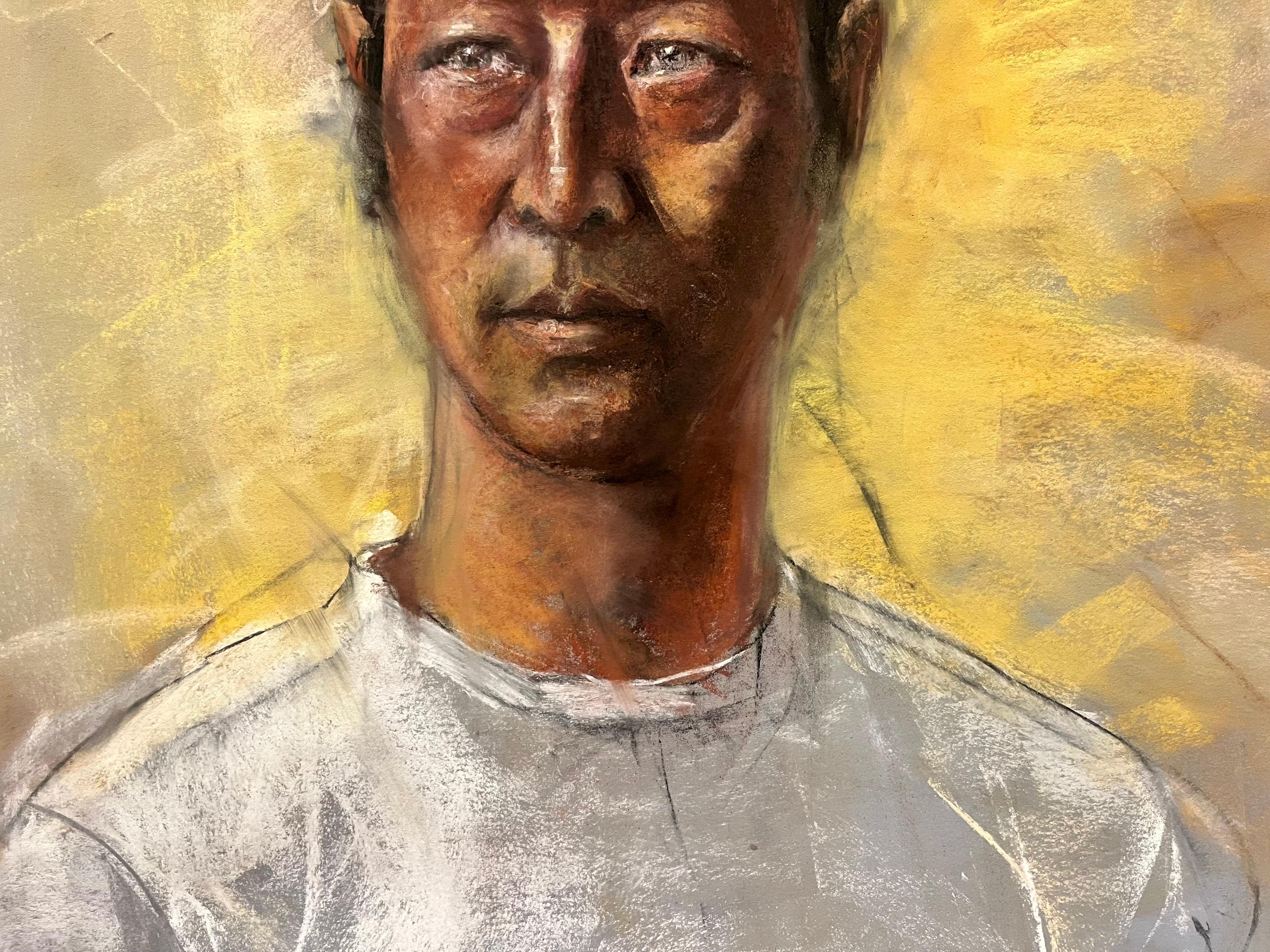 This vibrant pastel portrait features an Asian man with a ponytail, dressed in a simple white T-shirt, set against a bright yellow background. The contrast between the subject’s understated attire and the vivid backdrop brings an energetic dynamic