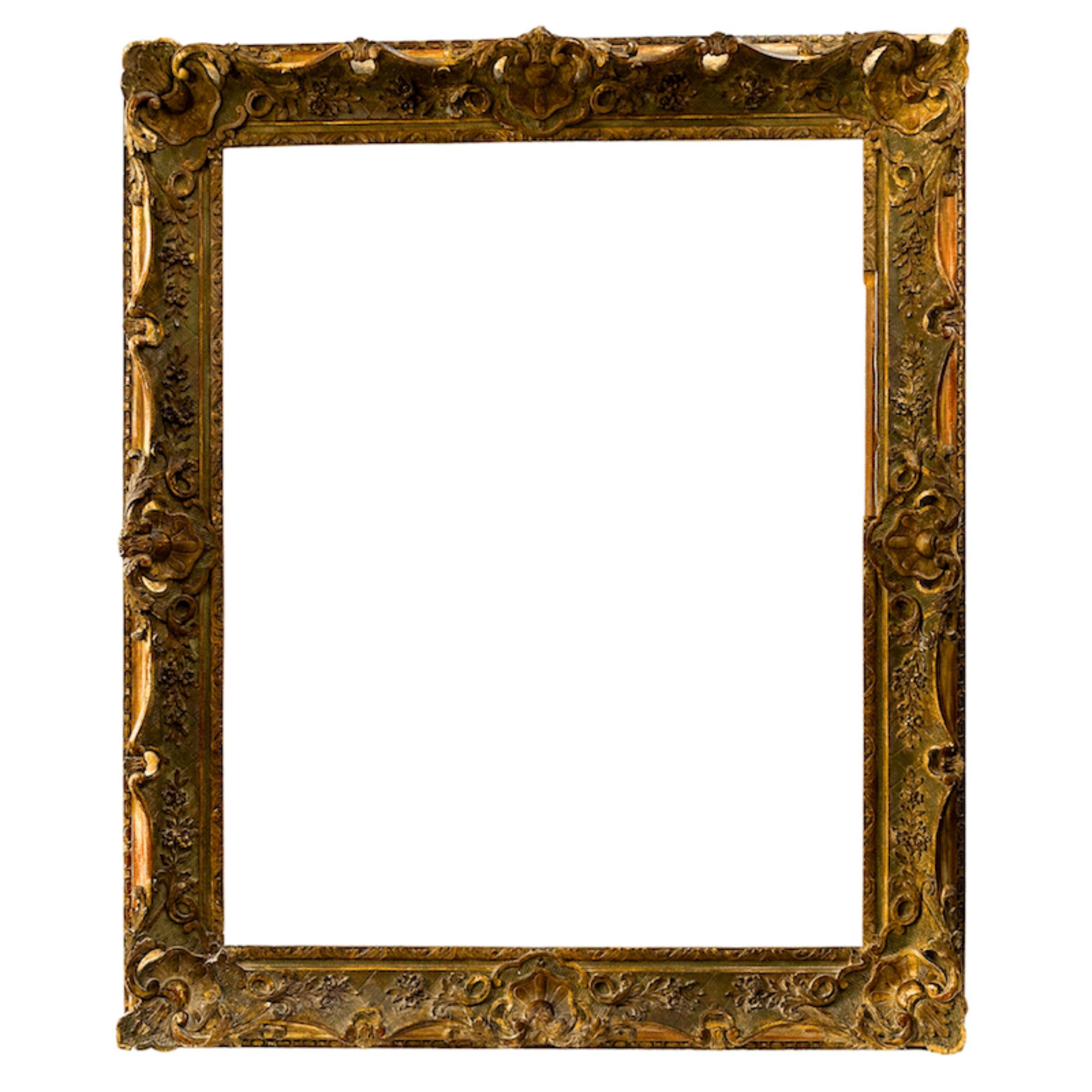 Grande cornice francese del XIX secolo con patina dorata, cartigli e volute d'acanto