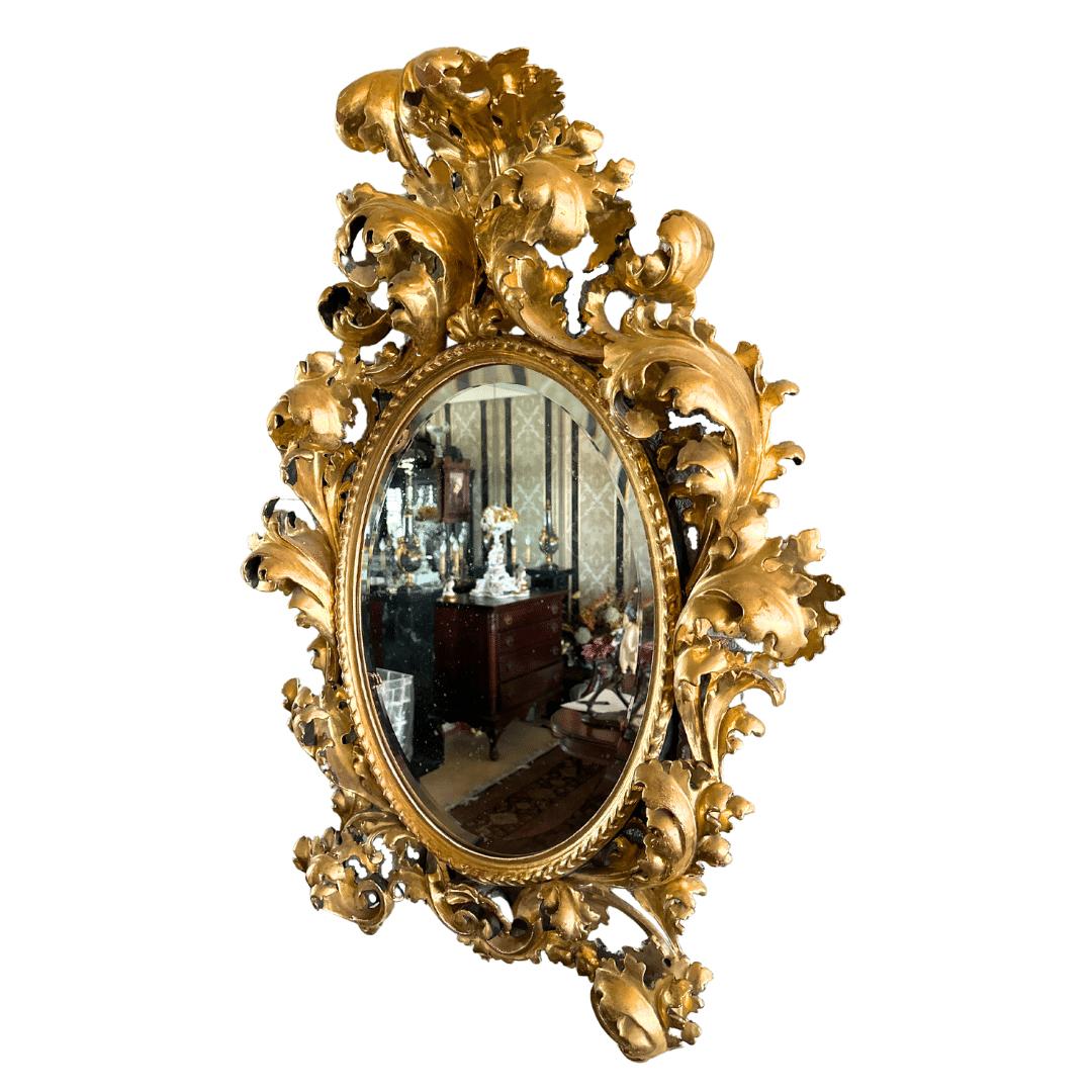 A Pair of Italian Carved Gilt Wood Antique Mirrors