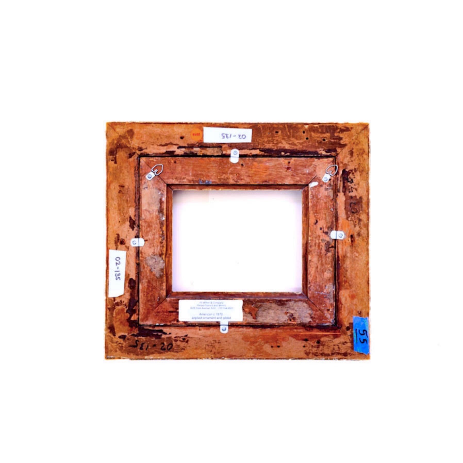 American 1870's Hudson River School Gilt/Wood Frame with fluted cove interior.

Rabbet Size: 9 x 7 in.
Sight Size: 8.25 x 6.5 in.
Overall Framed Size: 17 x 15 in.
(02-135)

Provenance: The Historic Period Frame Collection from the Gallery of Eli