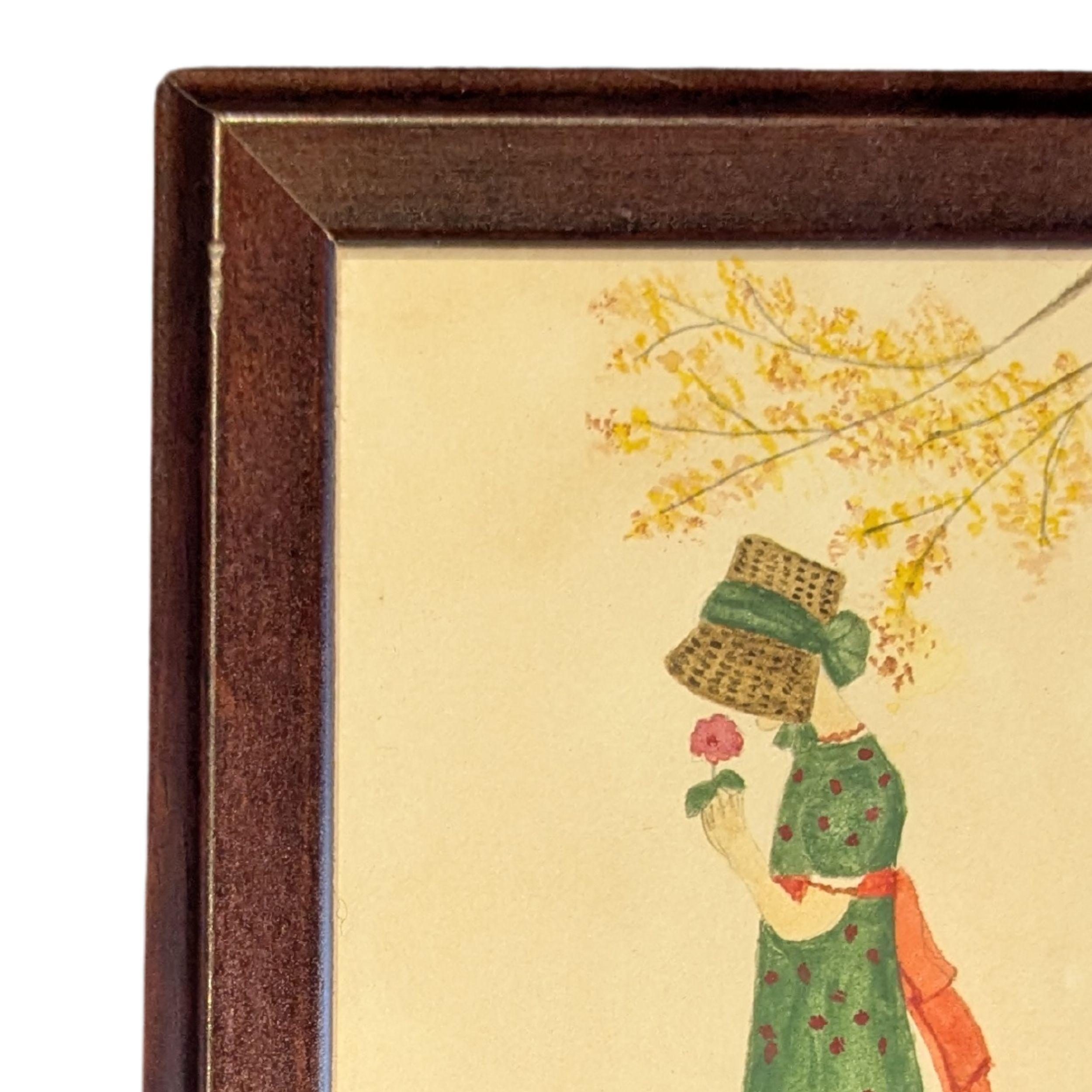 This charming watercolor painting by Evelyn S. Dumiel captures a moment of quiet innocence and curiosity between a young girl and a playful kitten. Dressed in a delicate floral dress with a soft bonnet framing her face, the child holds a single red