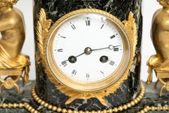 Pendule ancienne française Napoléon III en bronze doré et marbre vert des Alpes.