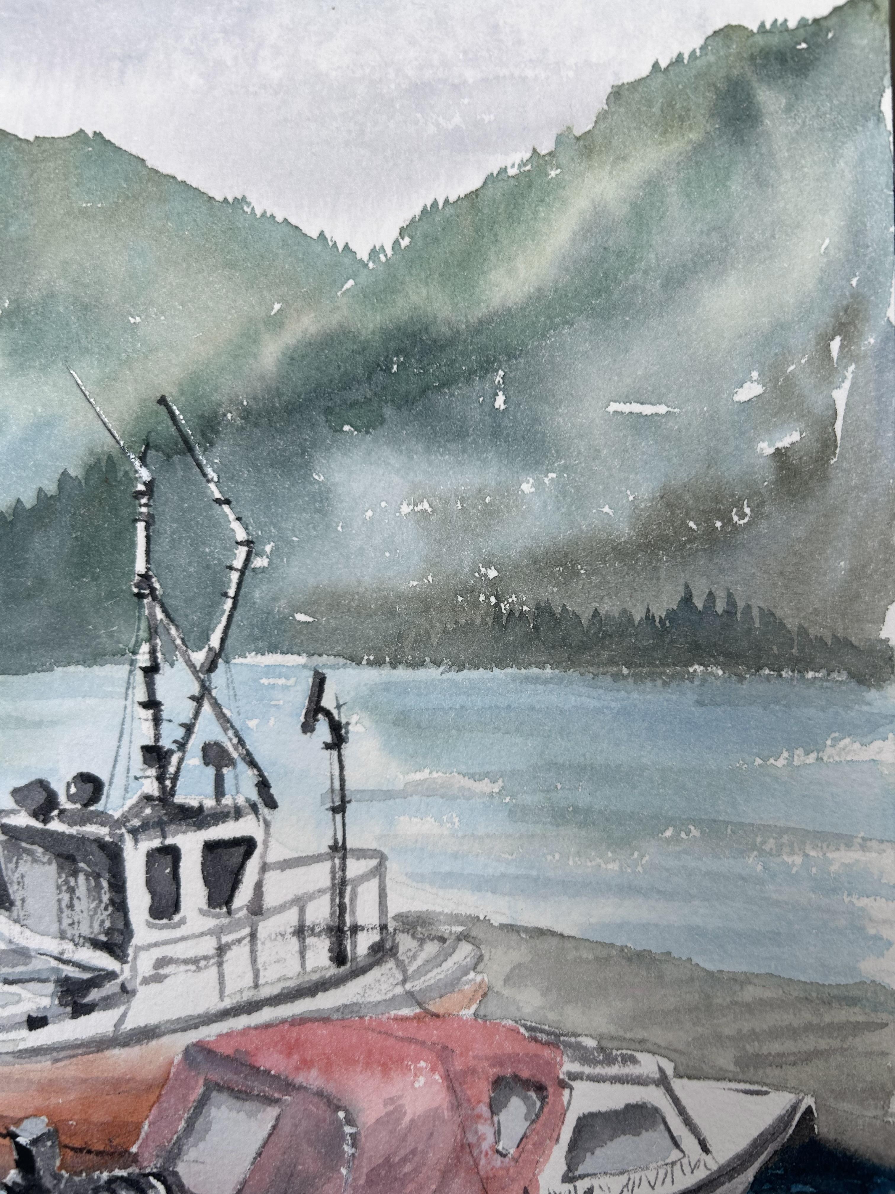 “Boats” landscape painting by Aleksandra Strokina captures a serene coastal scene, where two boats rest peacefully on calm waters. Gentle ripples reflect the vessels, adding a sense of movement and tranquility. Towering mountains rise in the