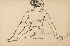 Femme assise sur un tapis