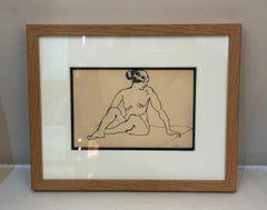 Femme assise sur un tapis