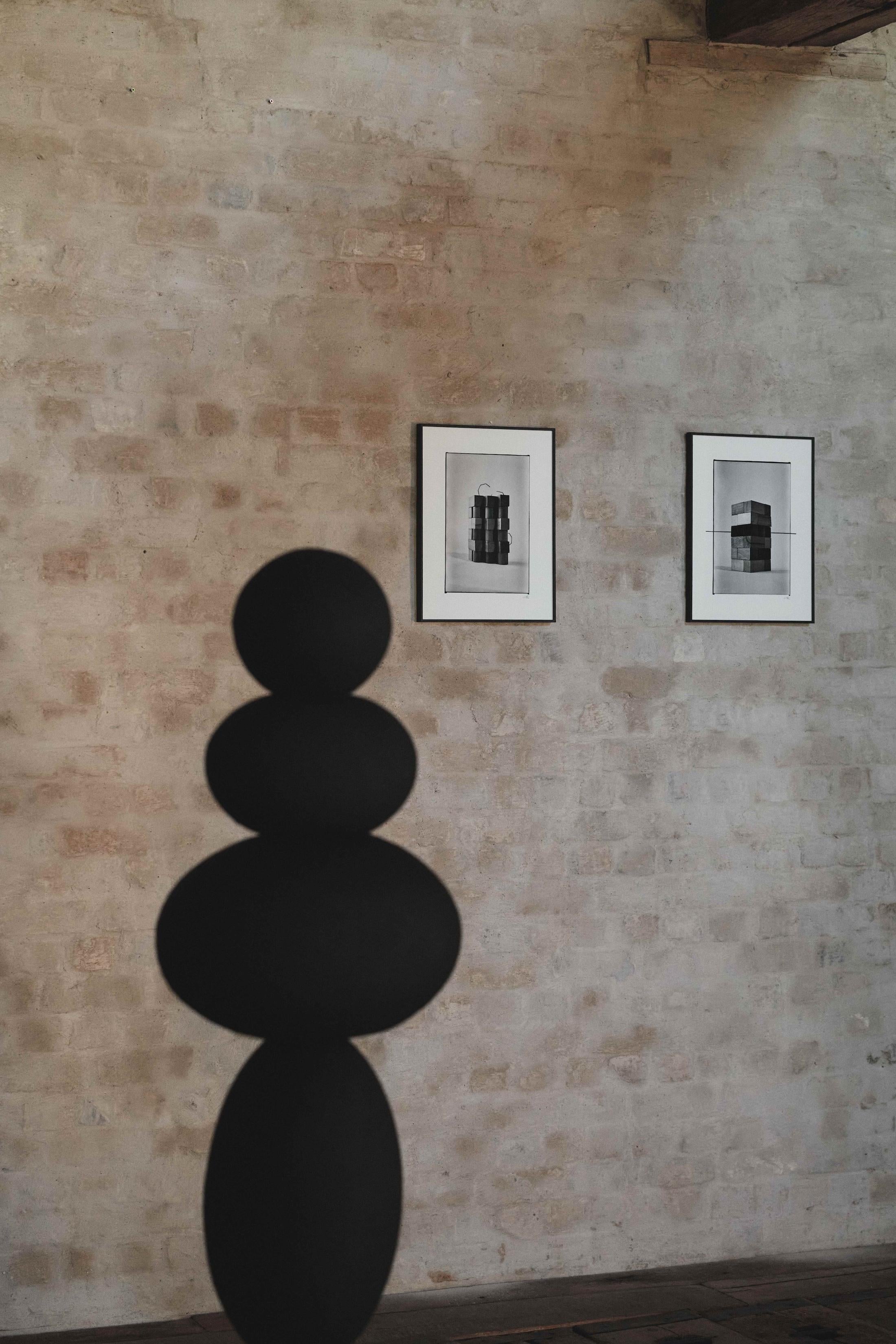 Brush and ink on black and white photograph

Unique hand-finished edition

In this photographic series, Conrad Willems extends his language of geometry, repetition, and modular construction into the medium of photography. Each image captures one of