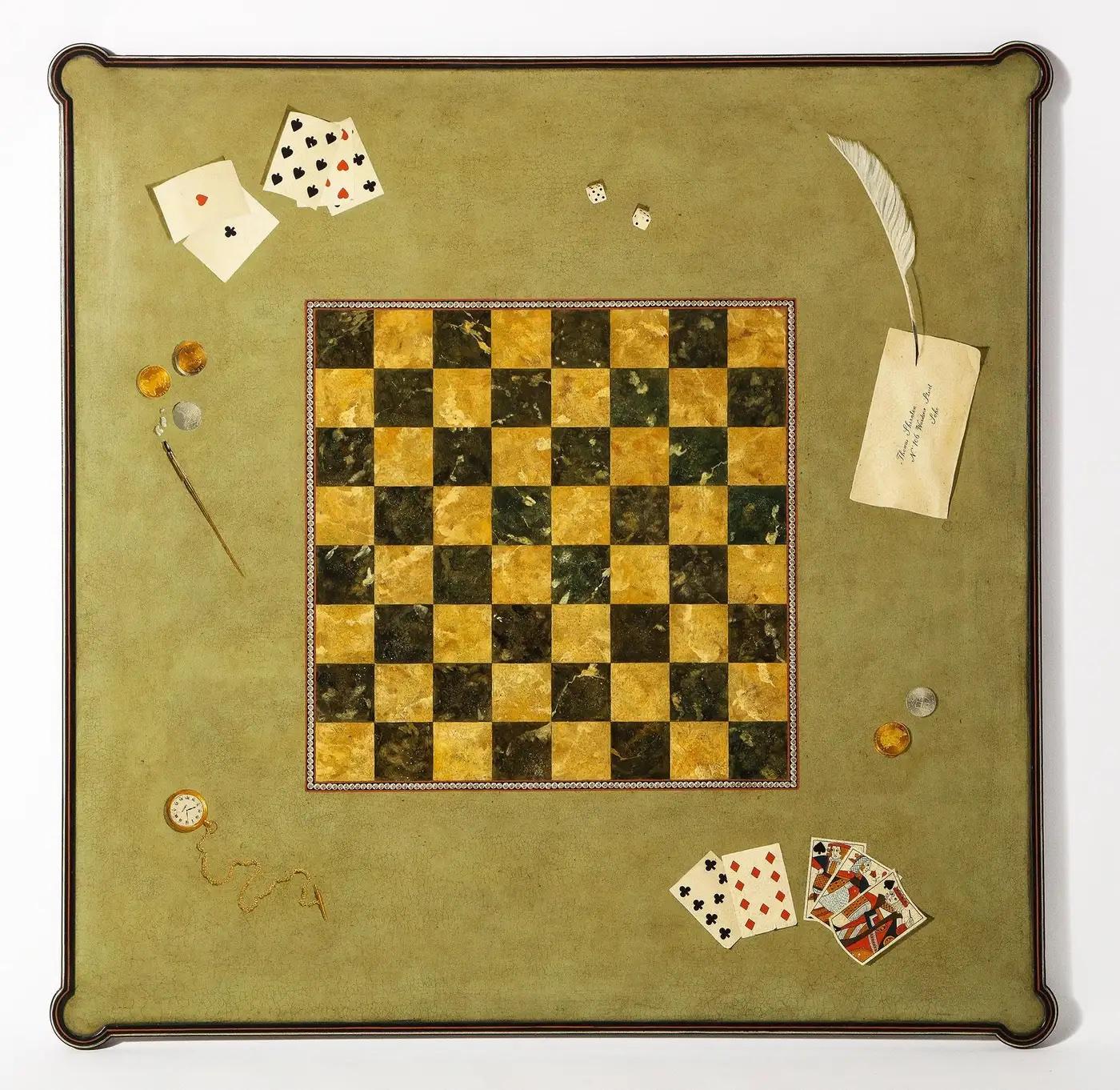 
This unique late 20th-century Louis XVI style card table blends elegance with versatility. The reversible top offers two distinct playing surfaces: one side features trompe l'œil painting depicting playing cards surrounding a chessboard, while the