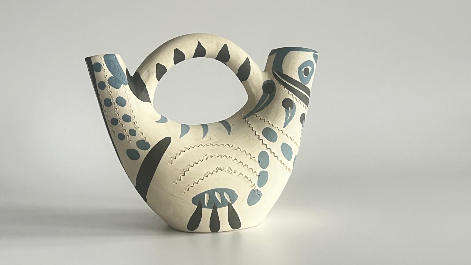 Pichet espagnol (A.R. 245)
stamped, marked and numbered 'Edition Picasso / Madoura Plein Feu / Edition Picasso / 152/200 / Madoura (underneath)
white earthenware ceramic pitcher, partially engraved, with coloured engobe and glaze
Length: 9 3⁄4 in.