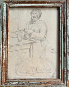 Woman embroidering with her dog