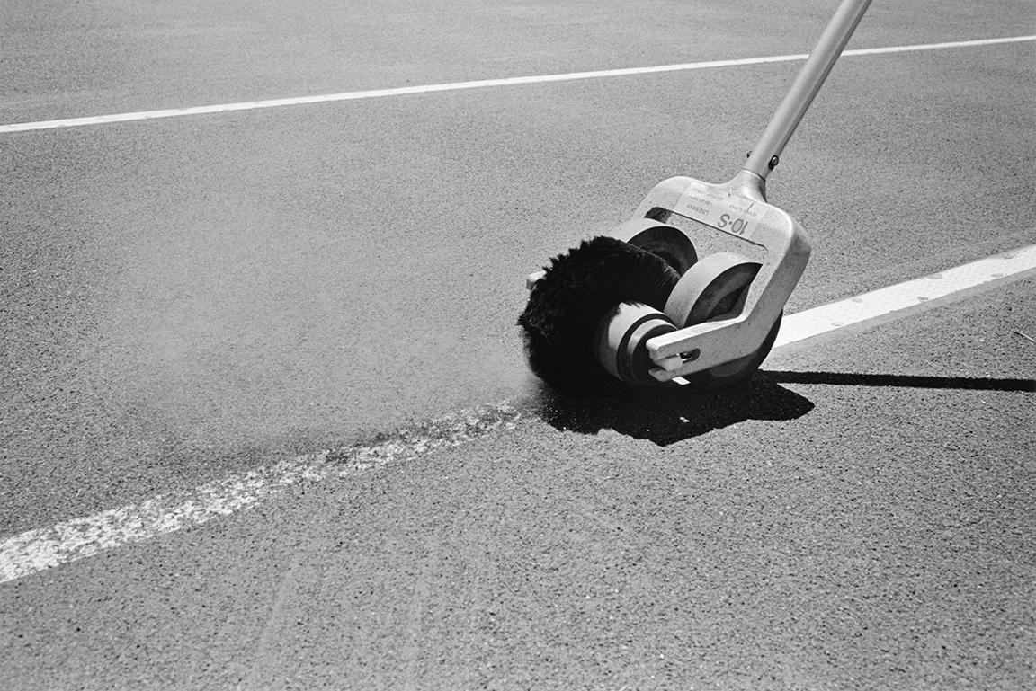Stephan Würth Black and White Photograph - Cleaning lines at the 96th Street Red Clay Tennis Courts, New York