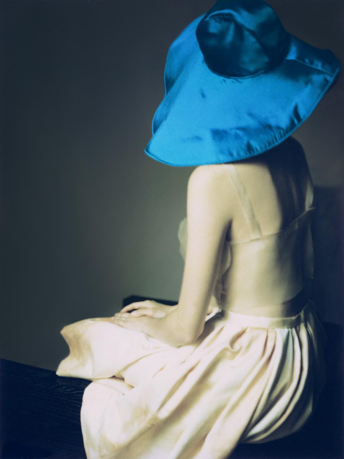 Erik Madigan Heck Color Photograph - The Blue Hat 
